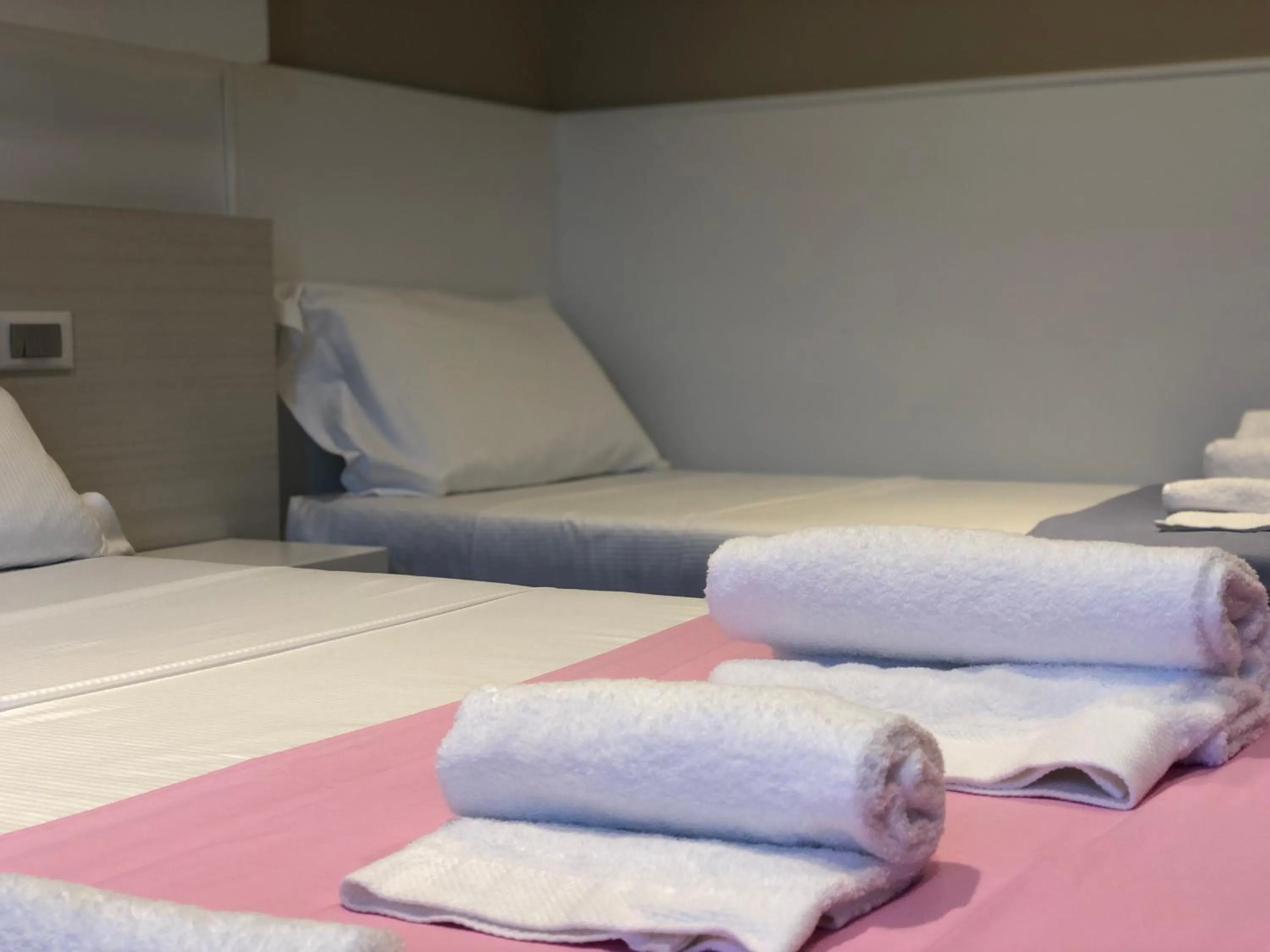 Bed in APPRODO RESiDENCE