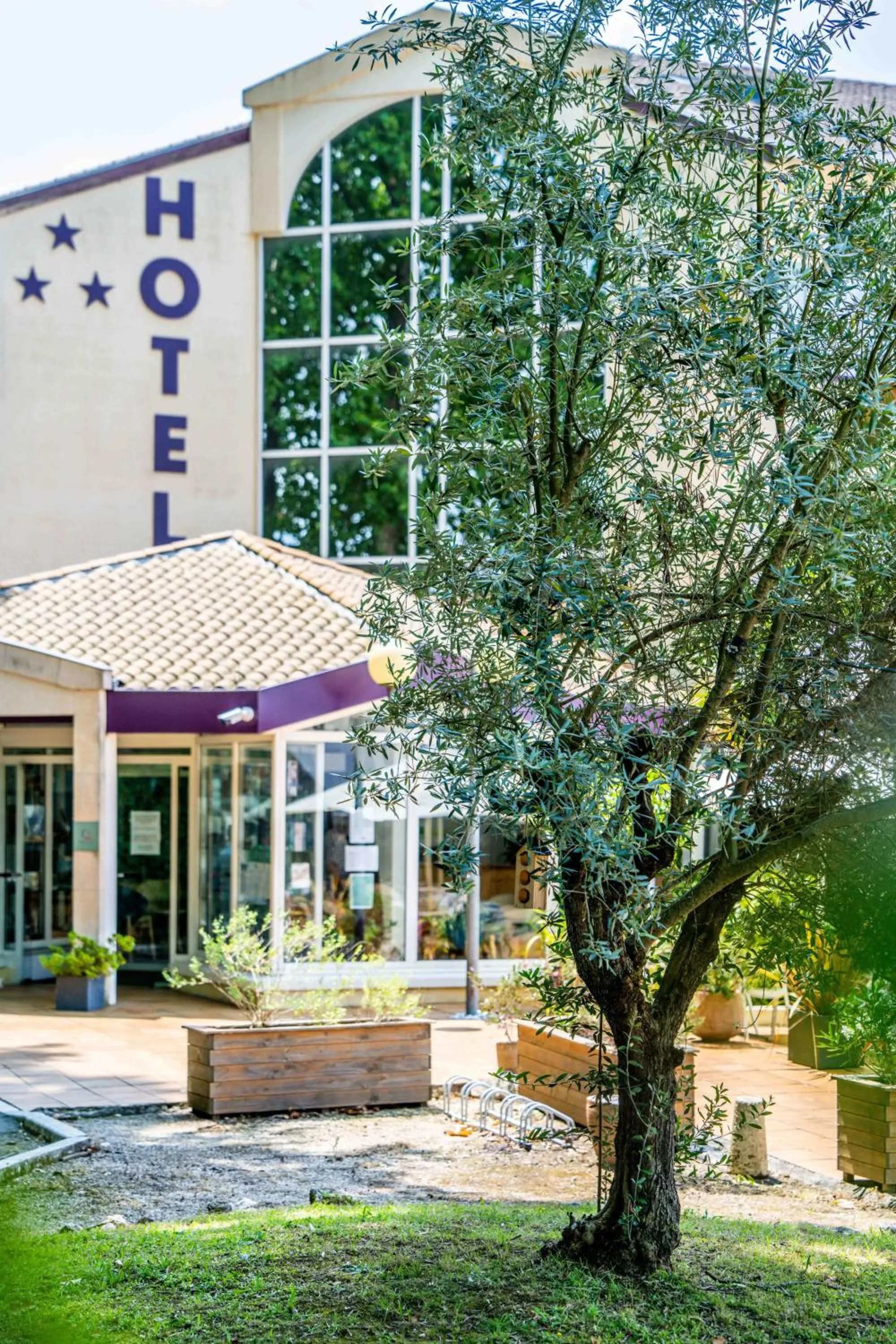 Property building in Logis Hôtel & Restaurant Ludik