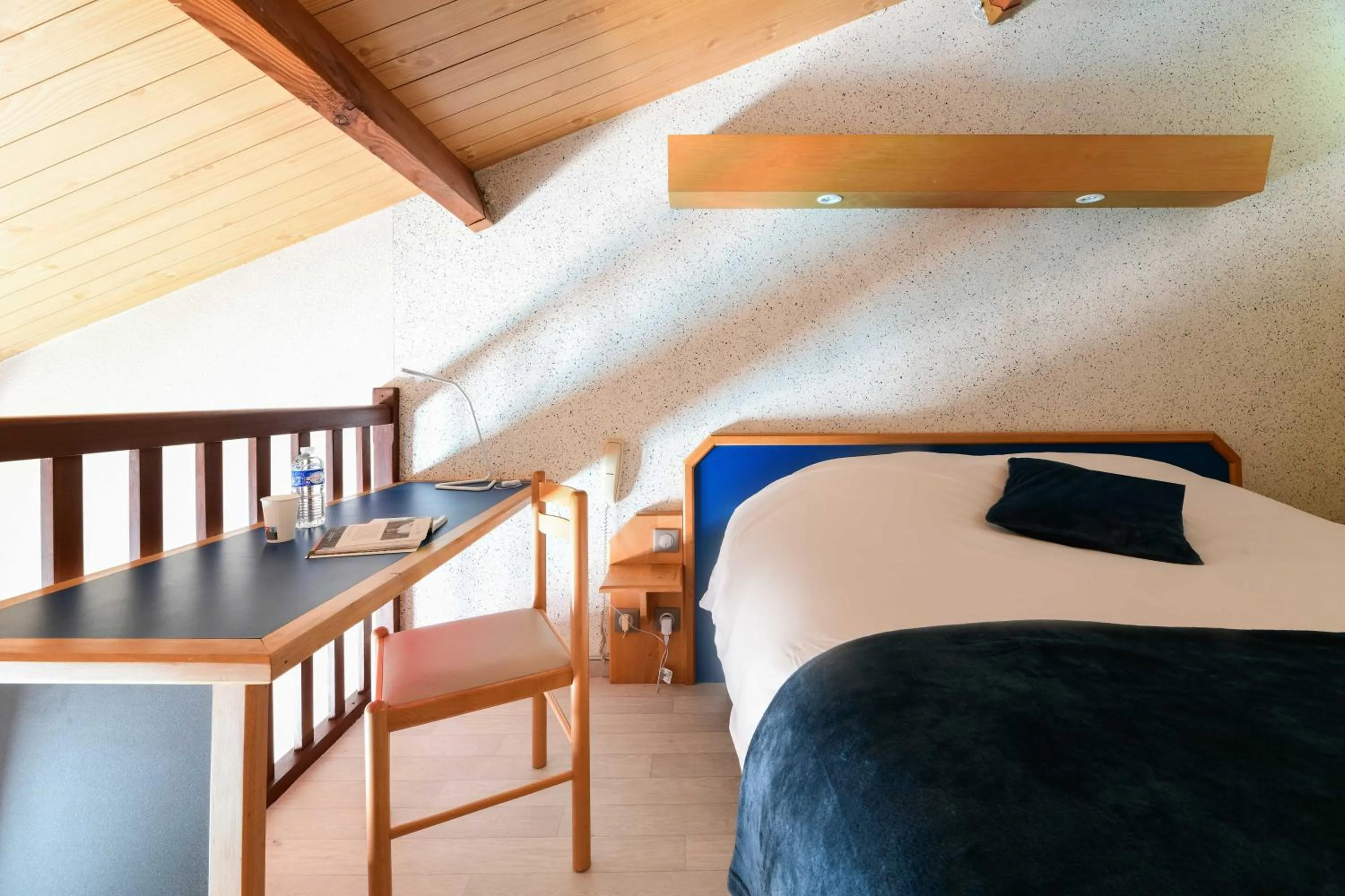 Bed in Logis Hôtel & Restaurant Ludik