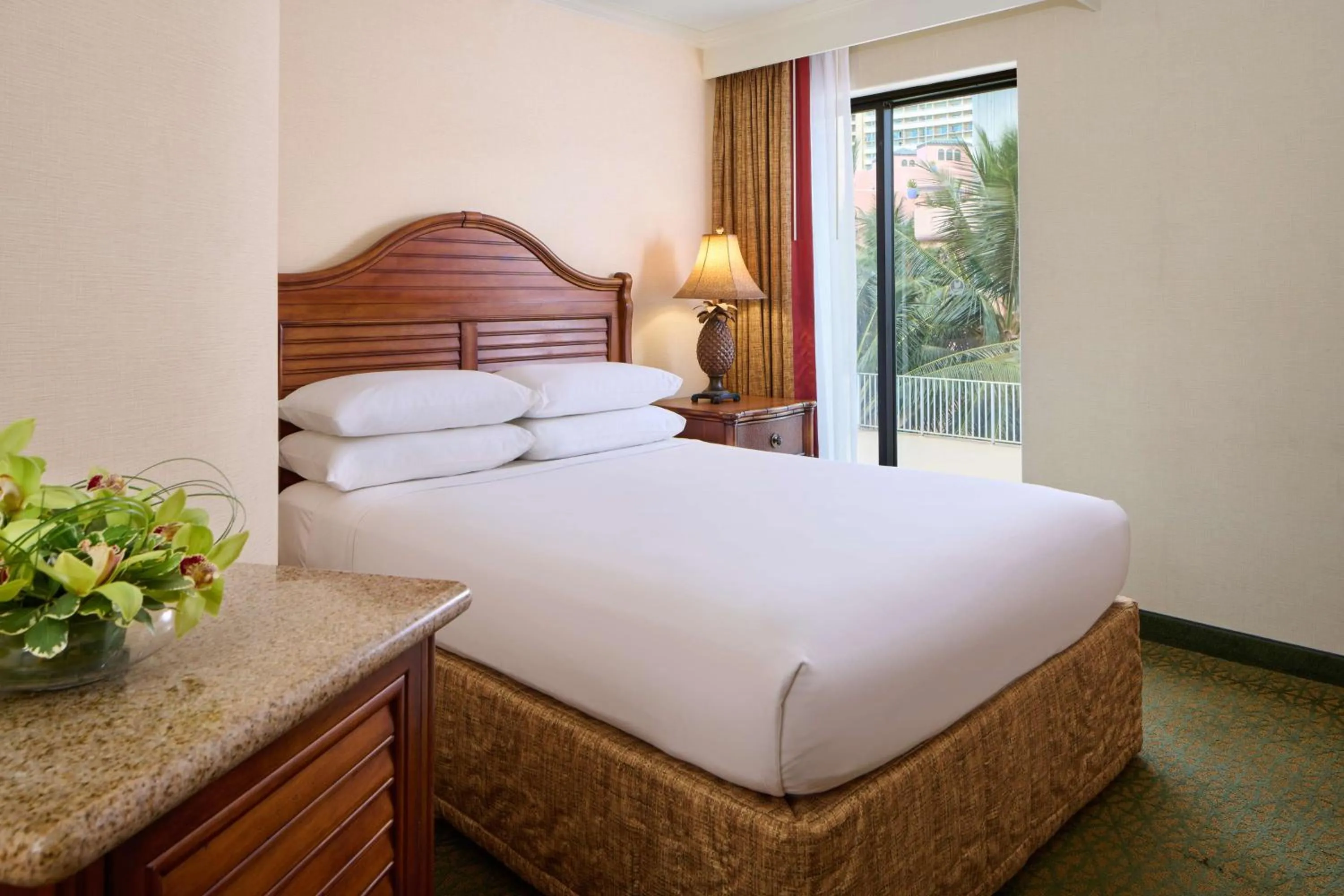 Photo of the whole room, Bed in OUTRIGGER Waikiki Beach Resort