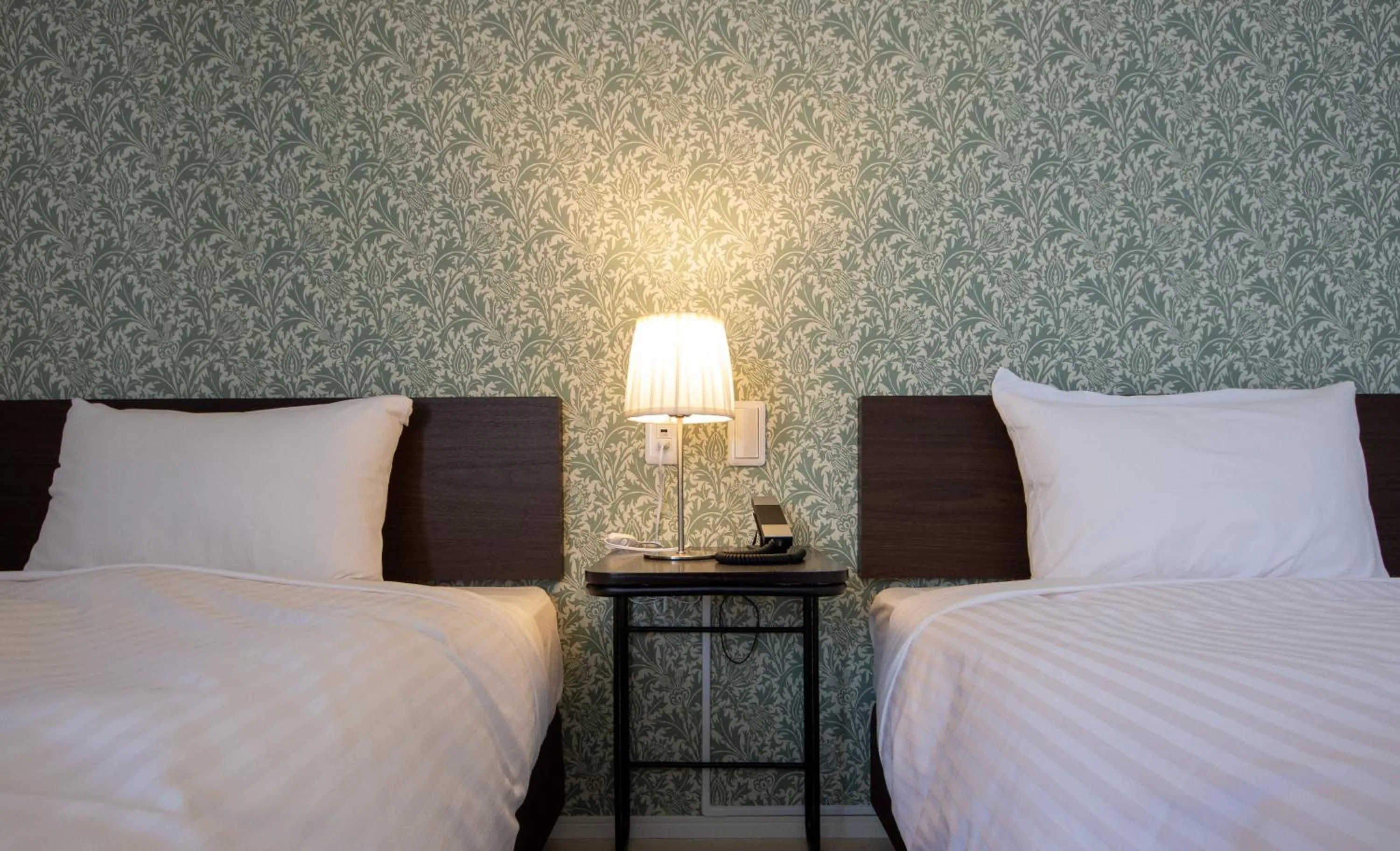 Bed in Cozy Inn OTARU