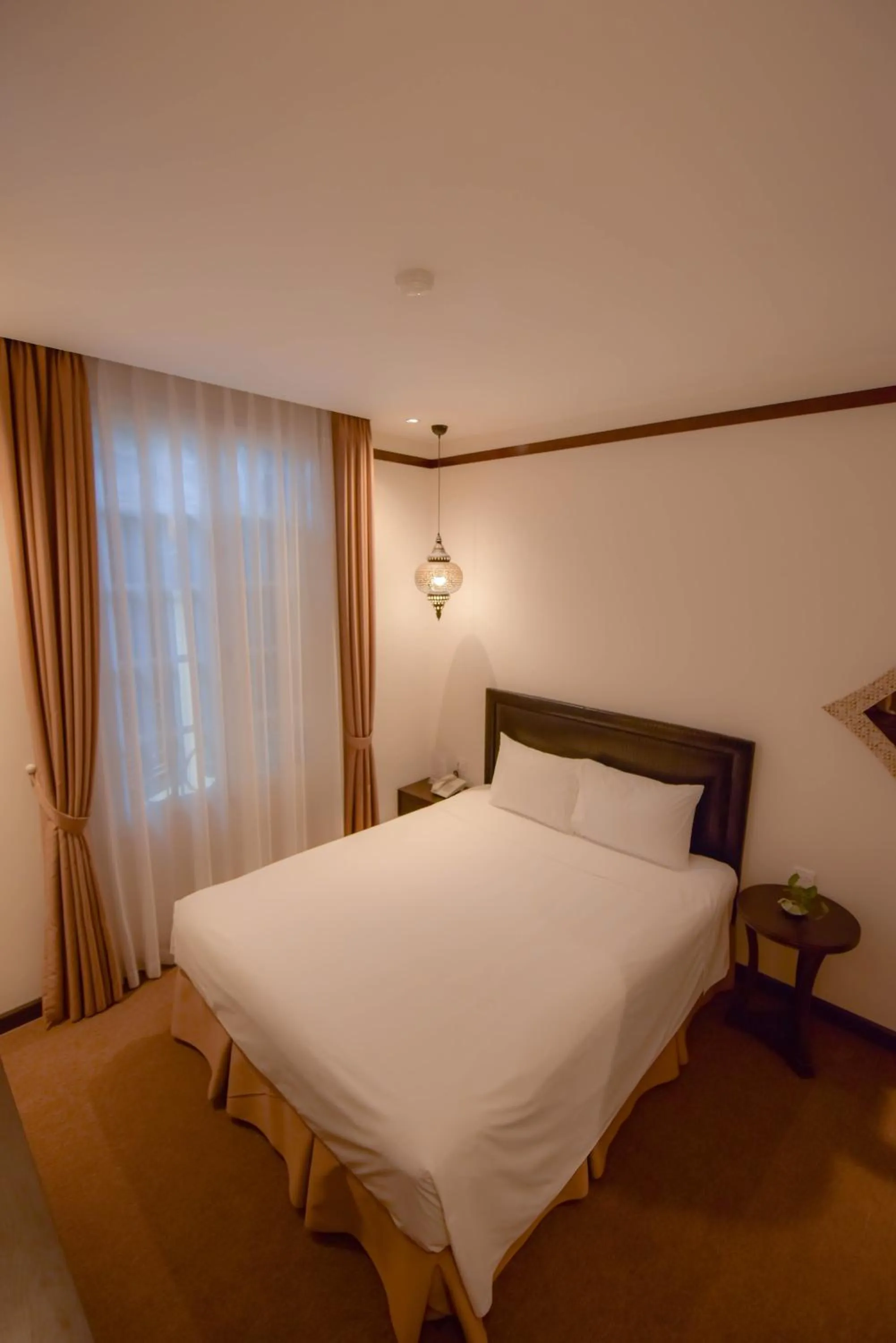 Living room, Bed in Rosa Hanoi Hotel