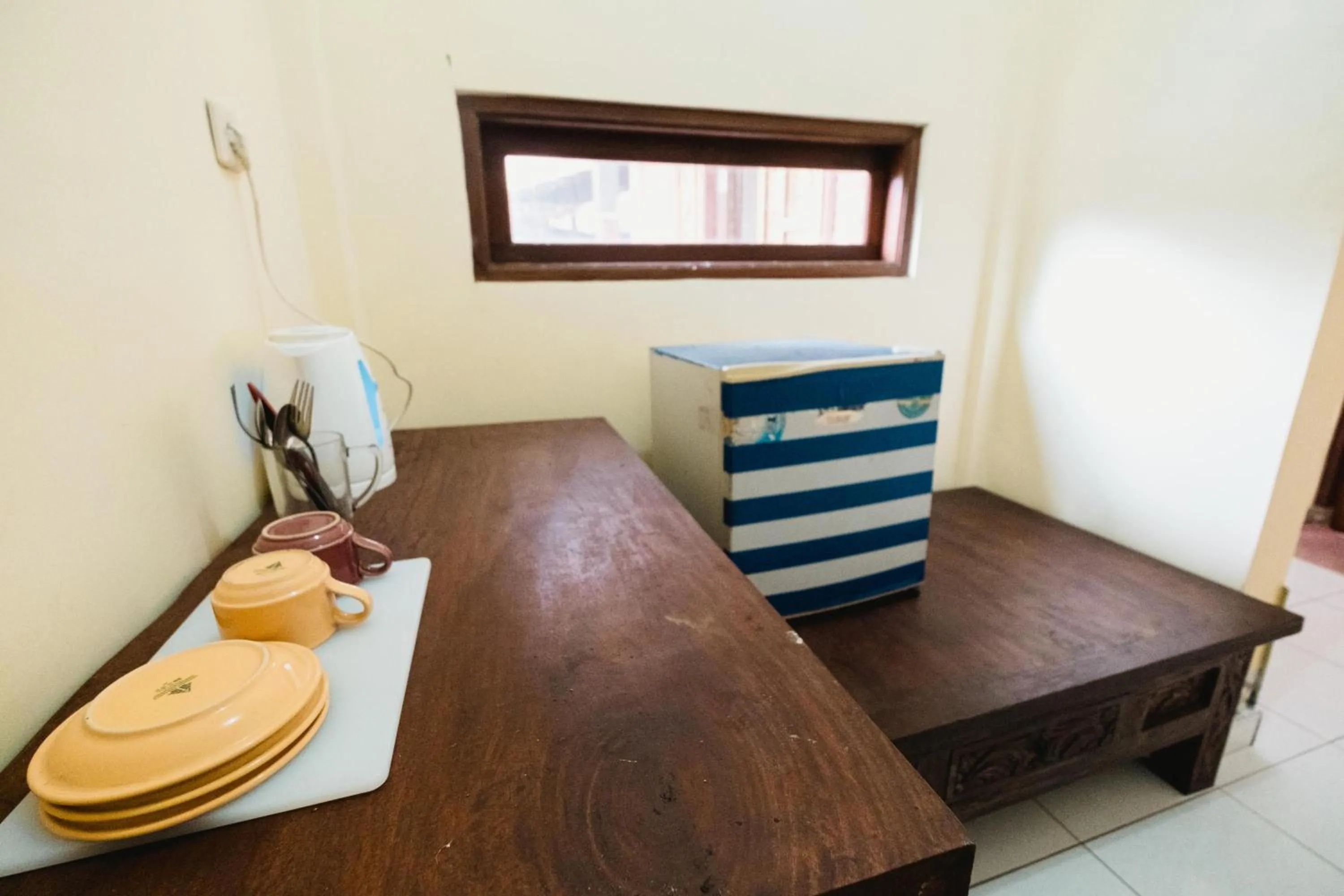 Kitchen or kitchenette, Bed in Rizky Guesthouse