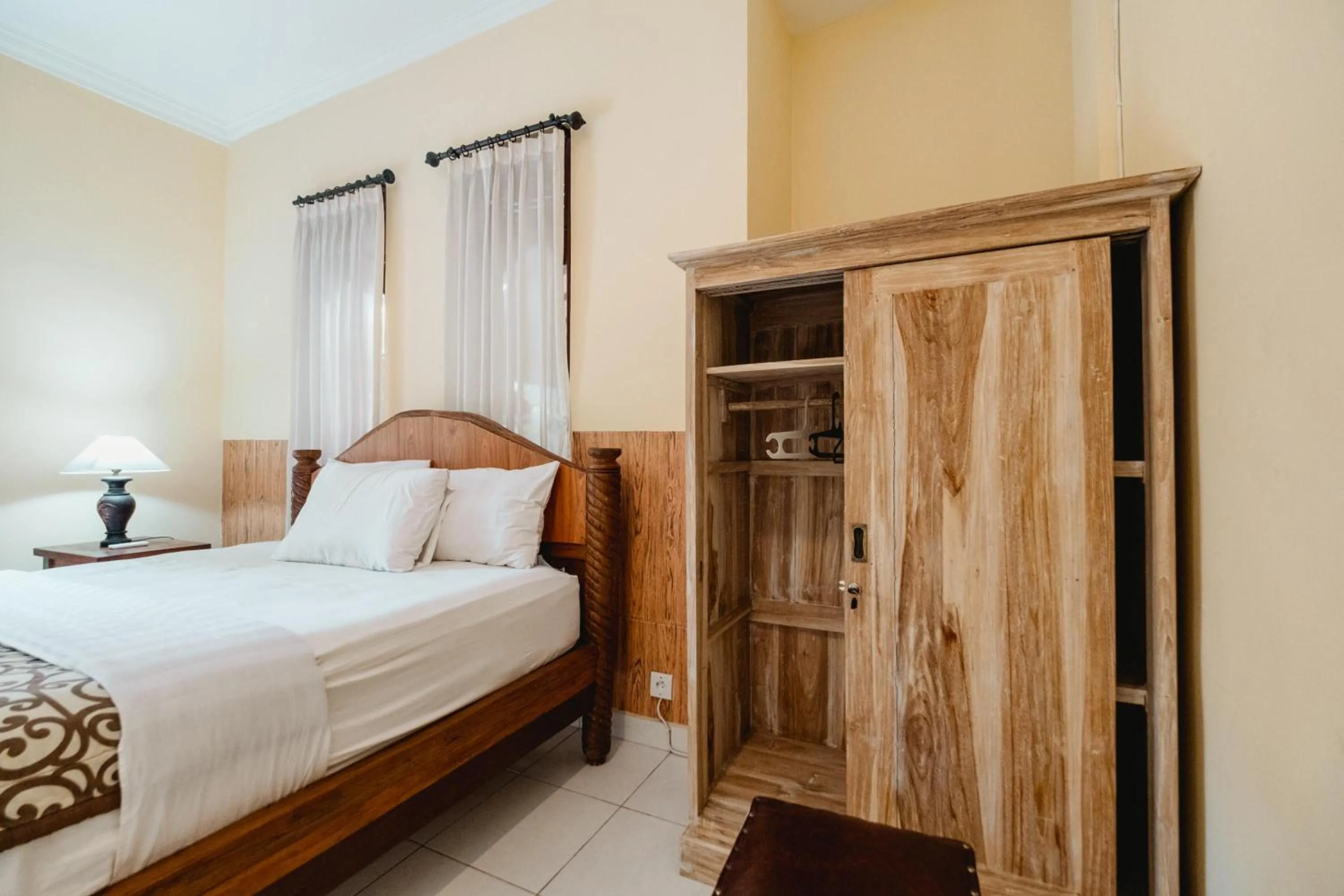 Bed in Rizky Guesthouse