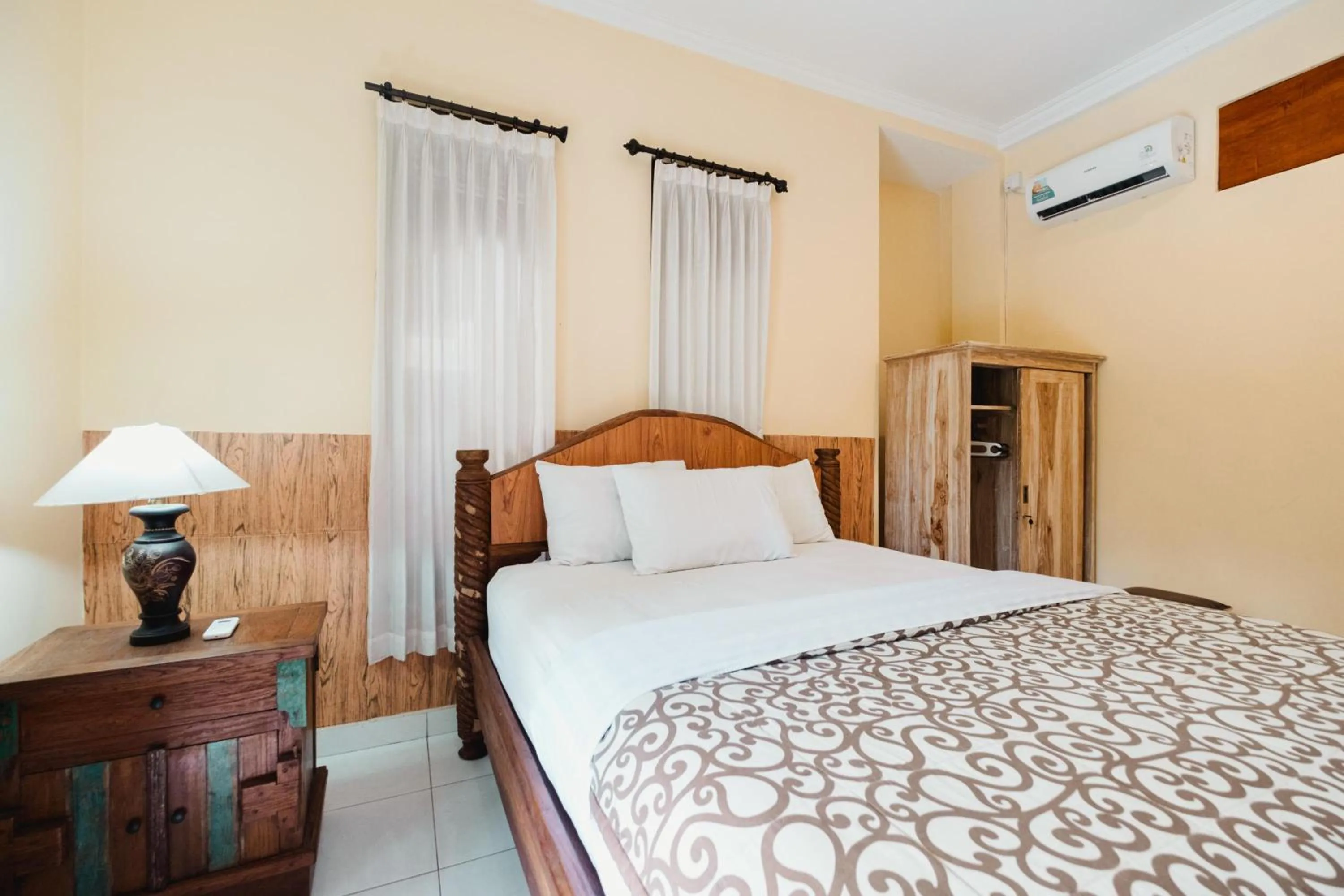 Bed in Rizky Guesthouse