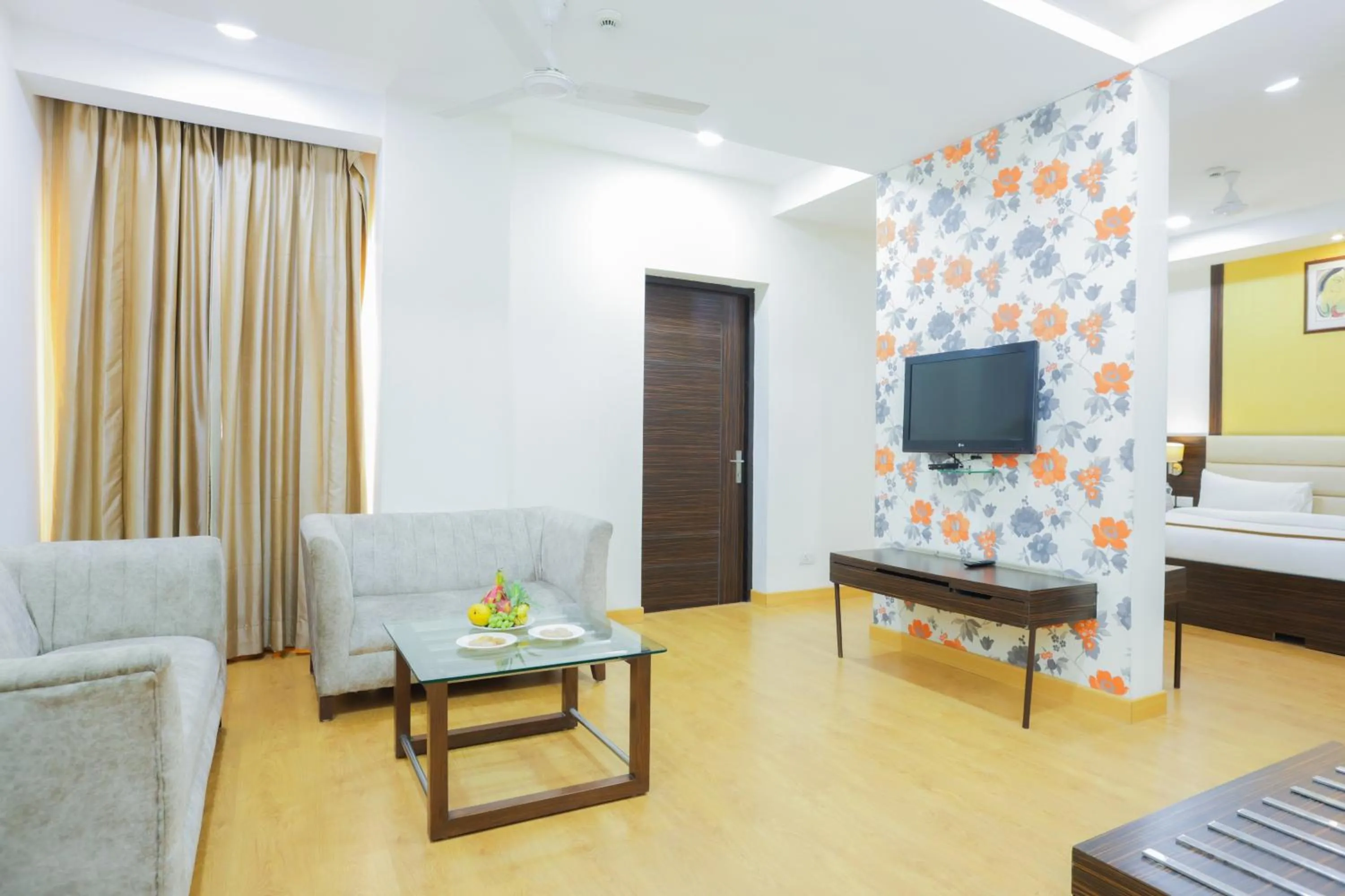 Living room, Bed in Hyphen Premier-Business Hotel