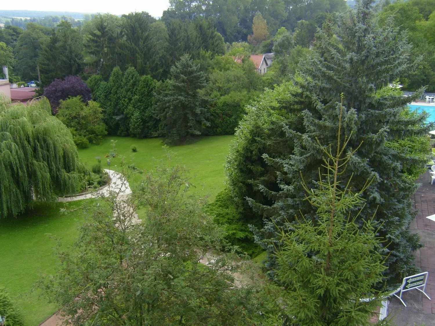Facade/entrance in Logis Hotel Maison Carrée Restaurant O Carré dArt