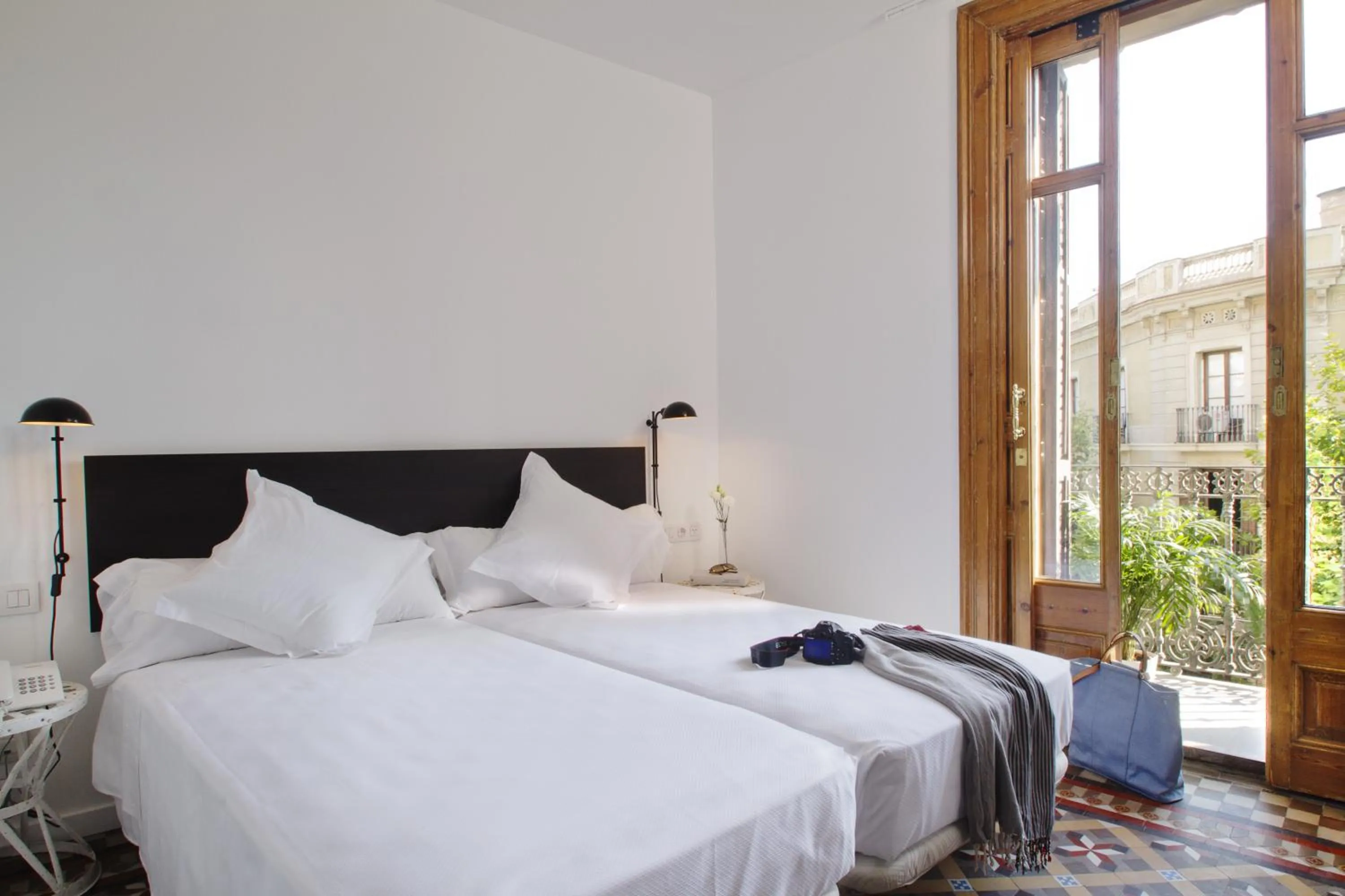 Photo of the whole room, Bed in Som Nit Triomf