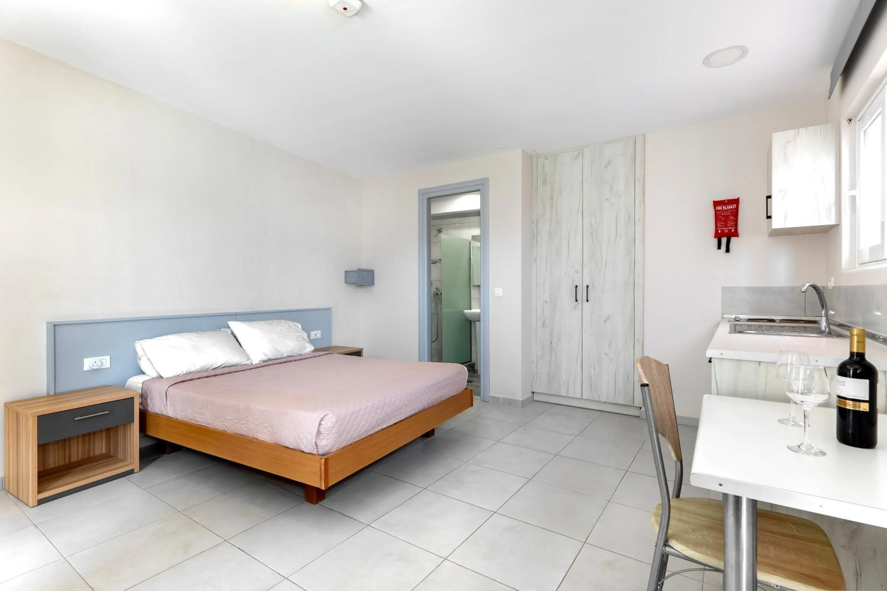 Bed in Anixis Hotel & Apartments