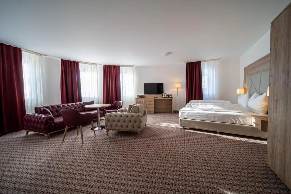 Living room, Bed in EE Hotel