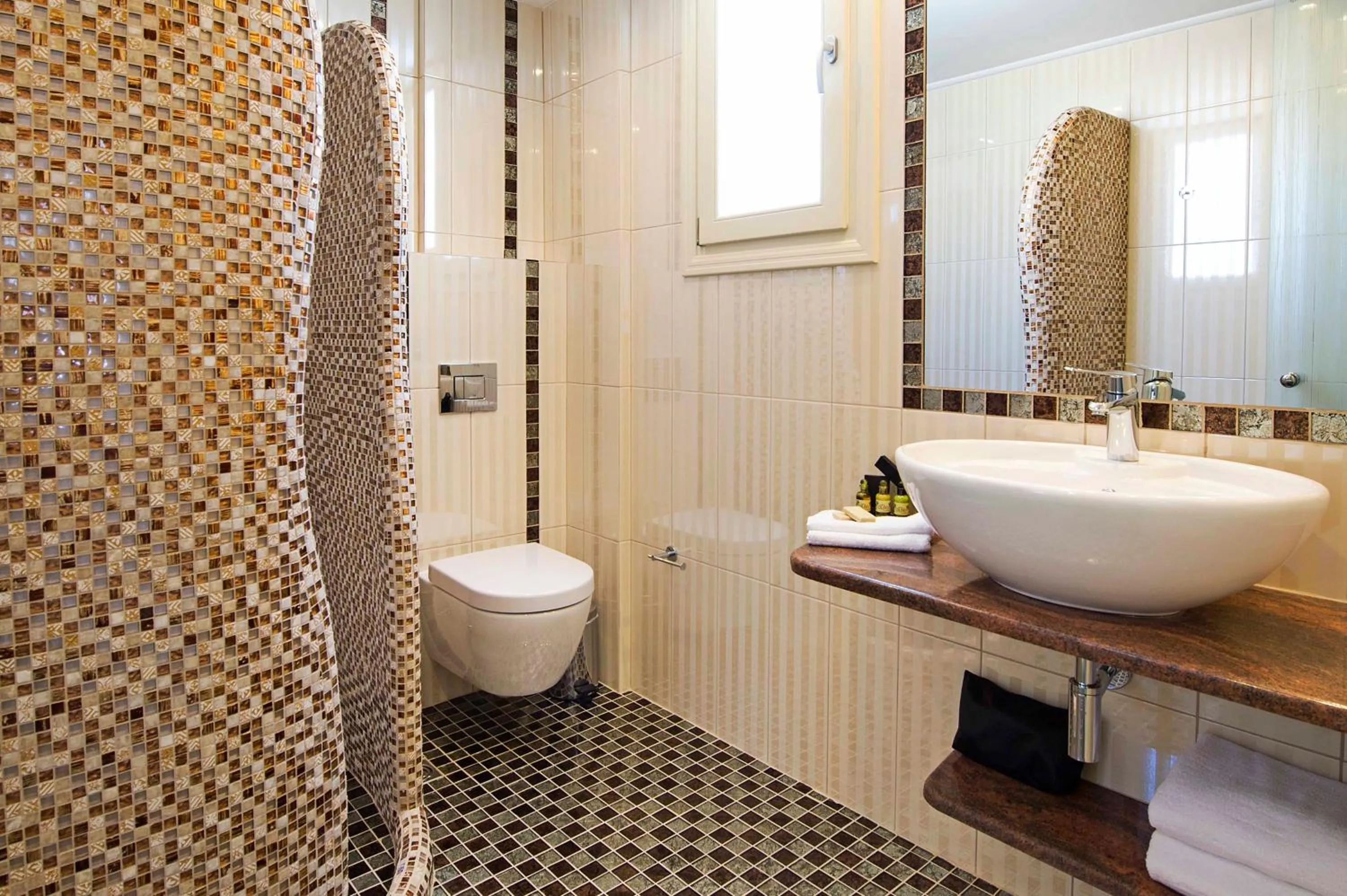 Bathroom in Acroterra Rosa Luxury Suites & Spa