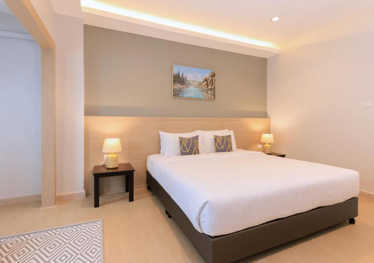 Bed in Baan Phor Phan Hotel