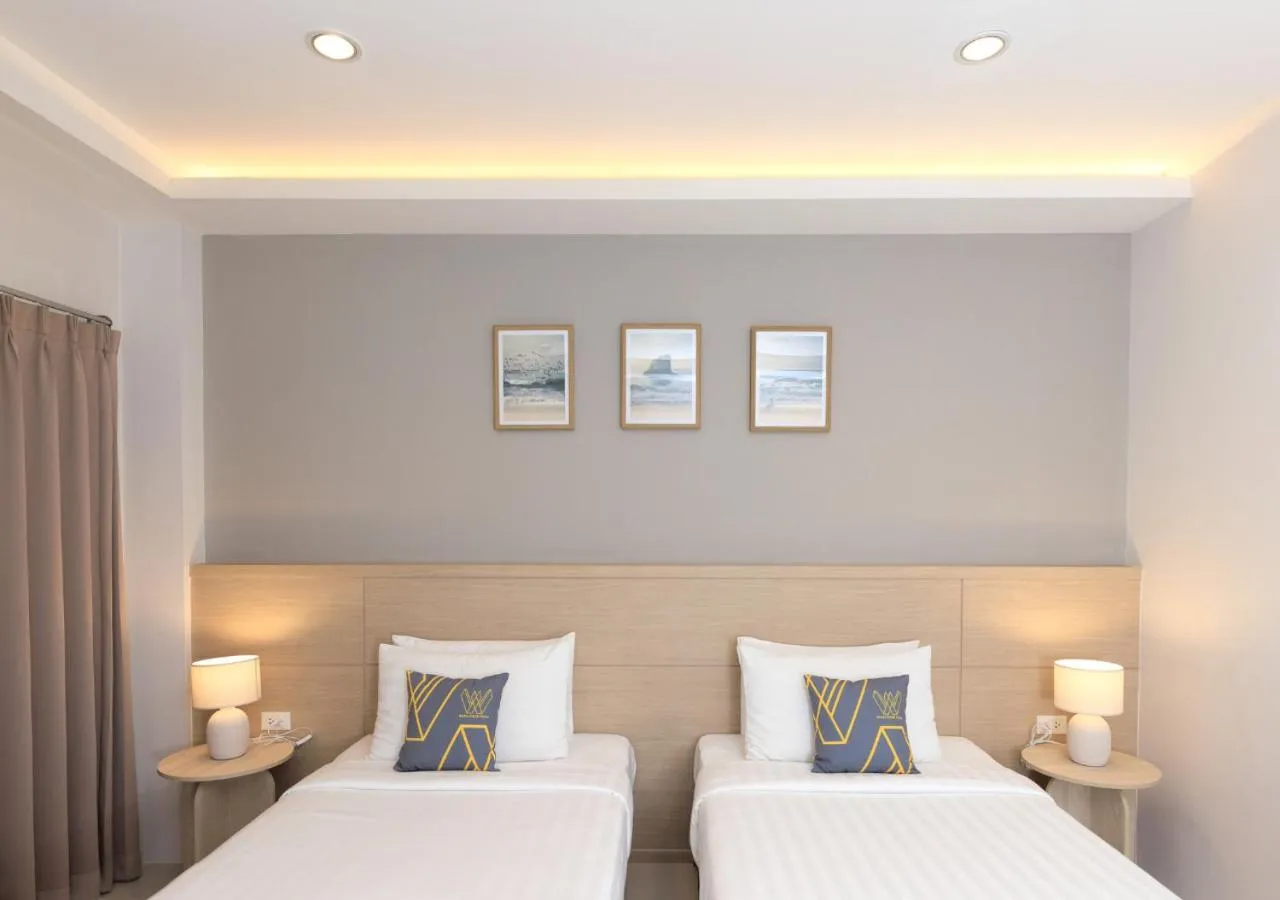 Bed in Baan Phor Phan Hotel