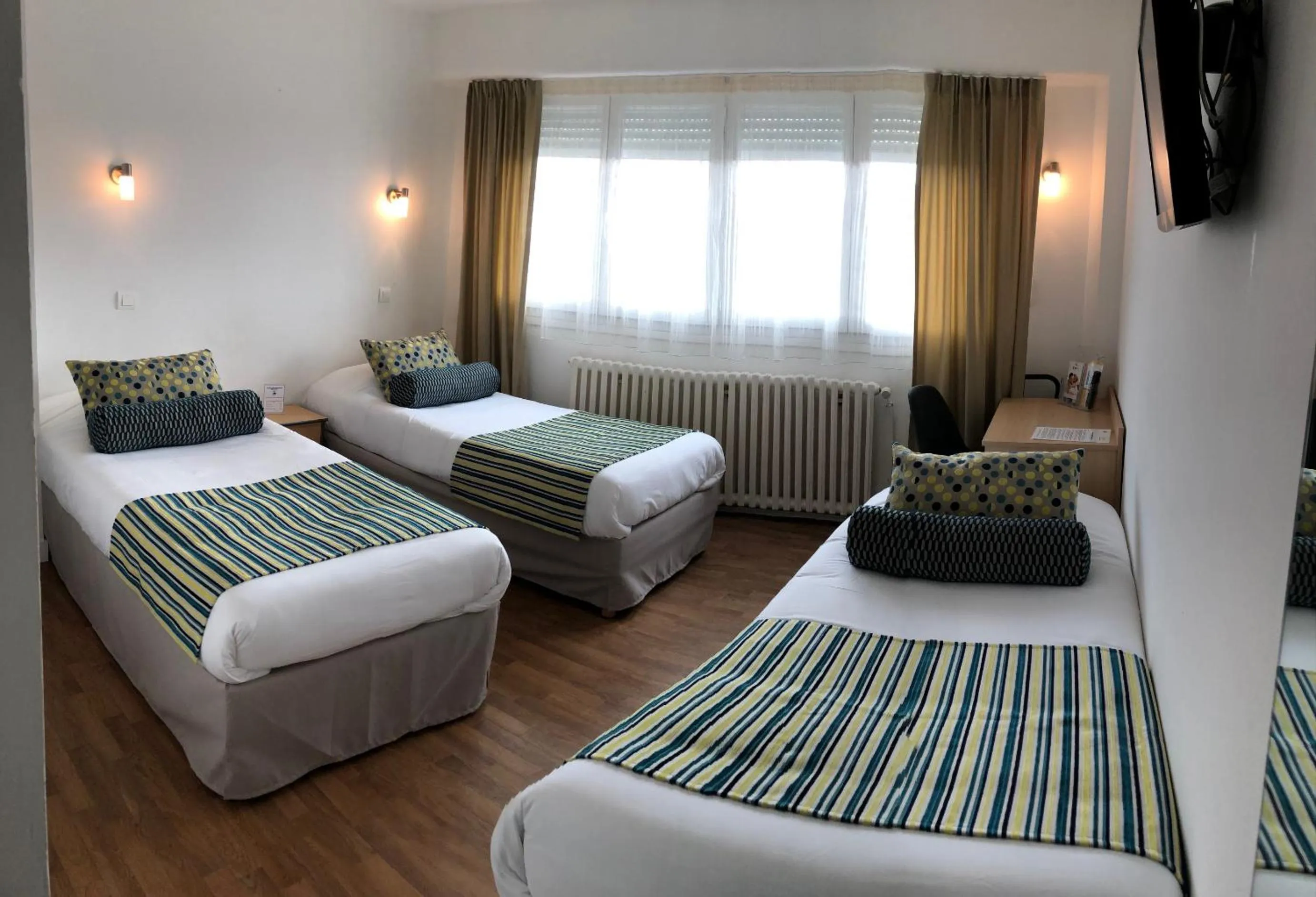 Bed in Cit'Hotel Atlantis