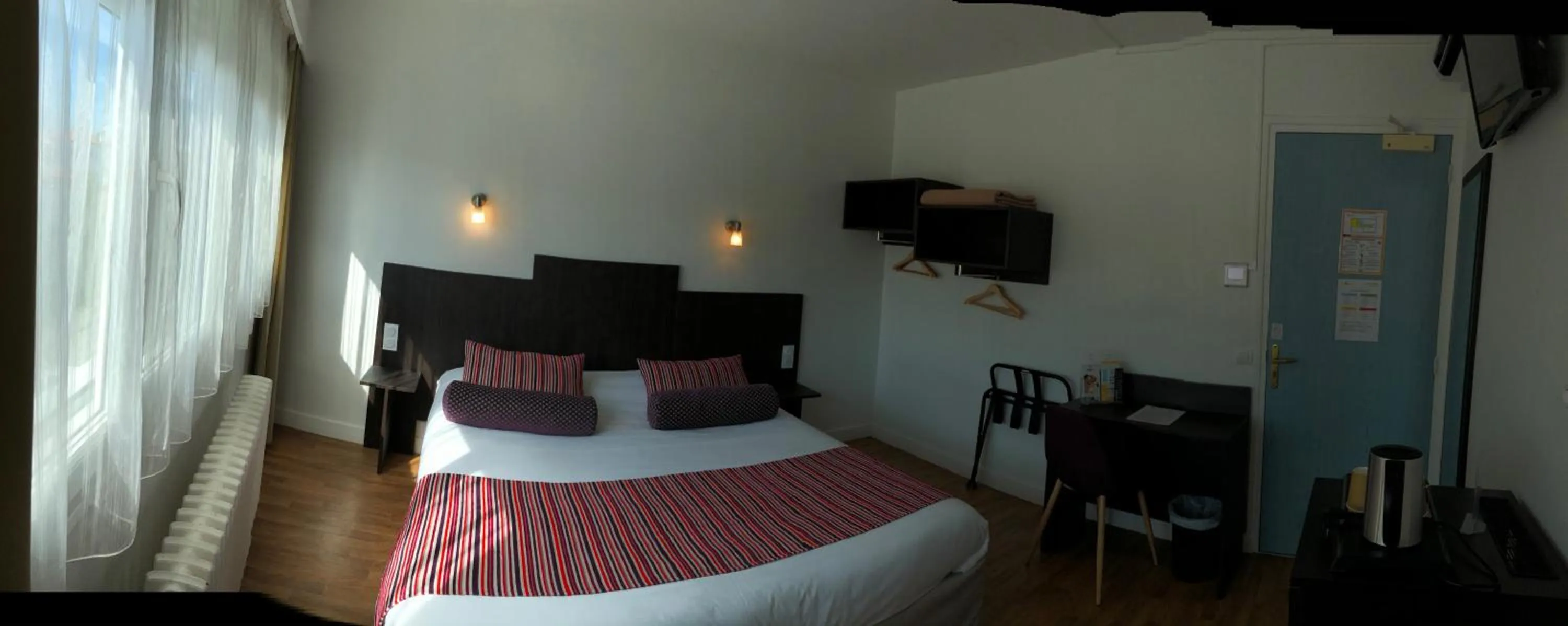 Bed in Cit'Hotel Atlantis