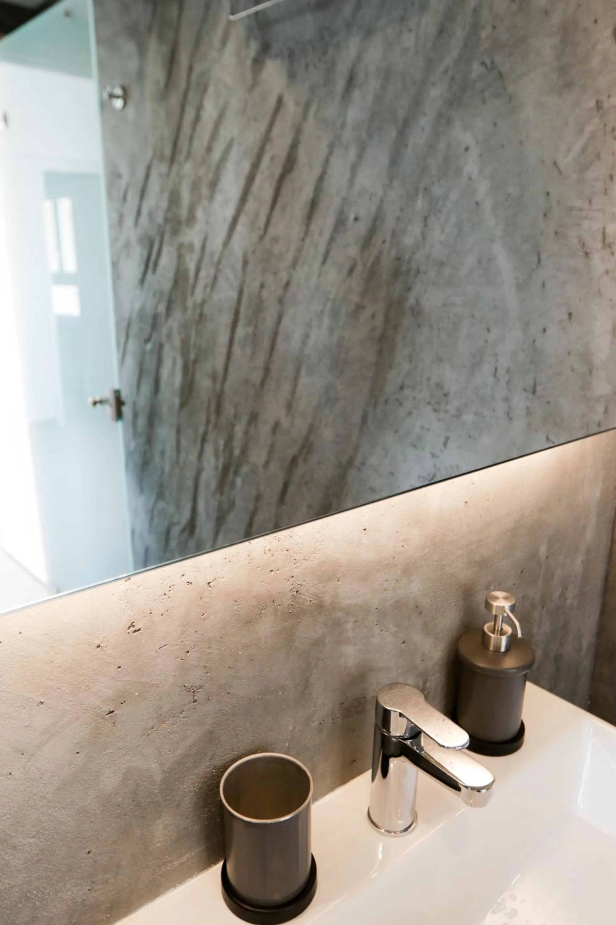 Bathroom in V36 Suites