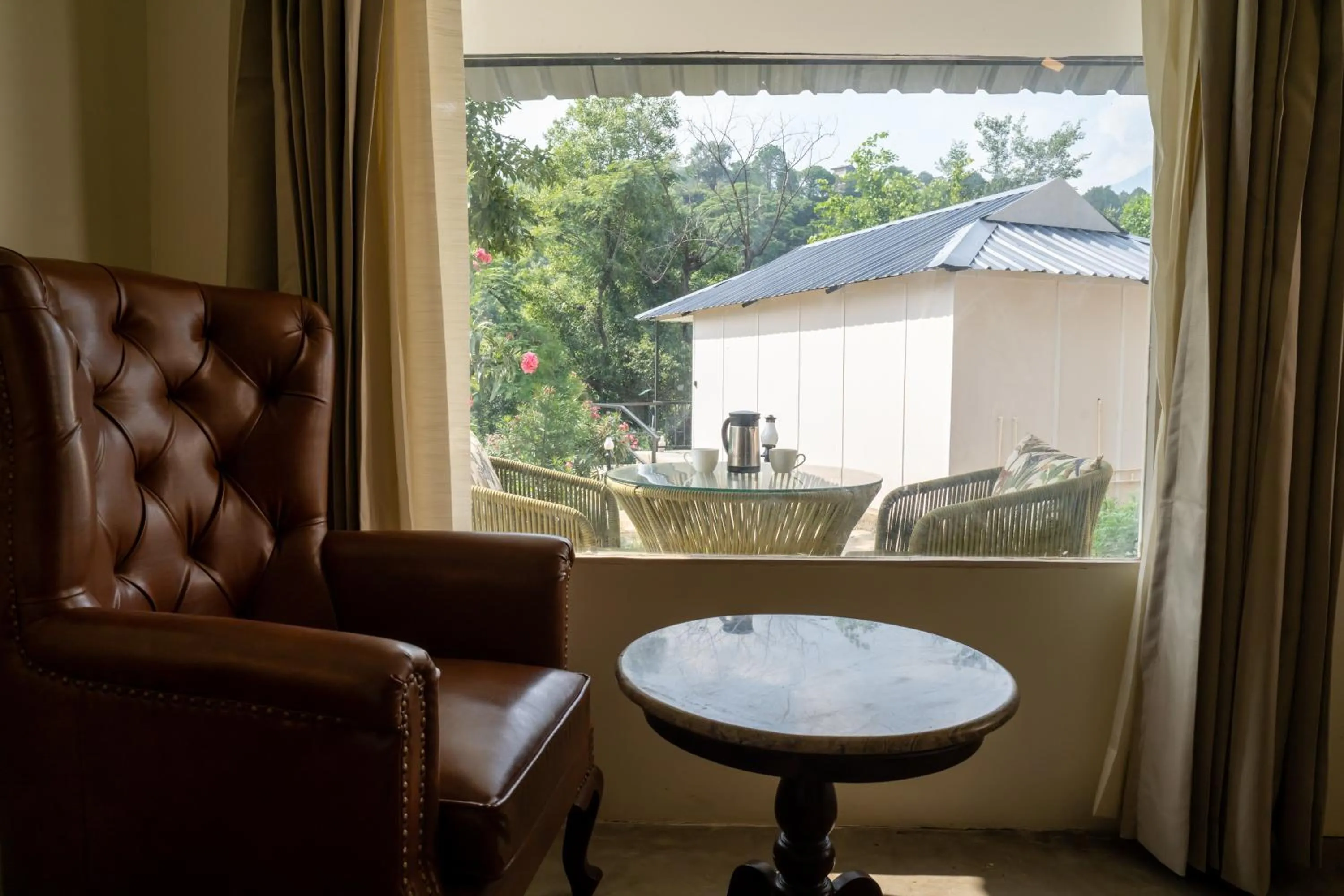 Bedroom in Dev Bhoomi Farms & Cottages