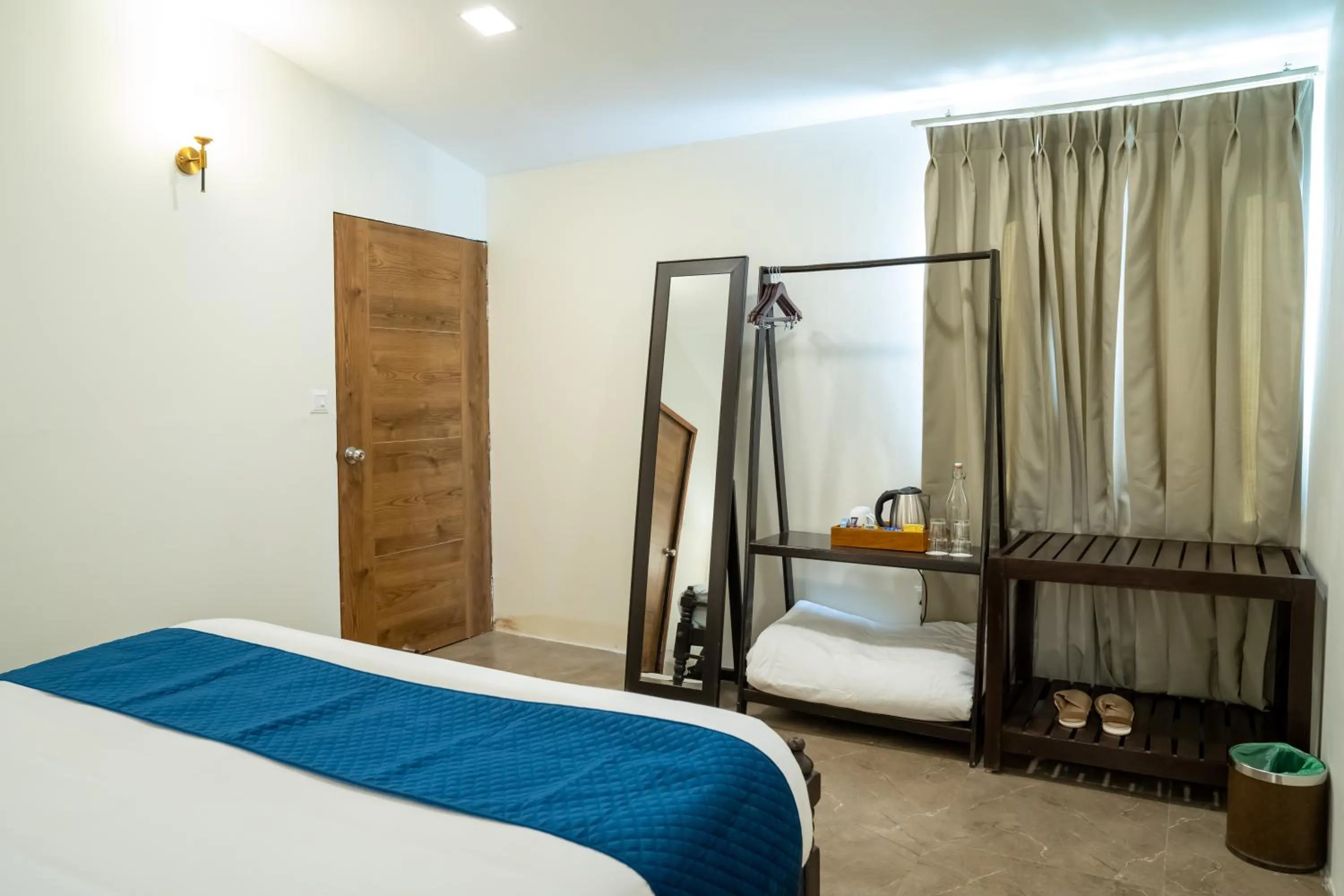 Bedroom, Bed in Dev Bhoomi Farms & Cottages