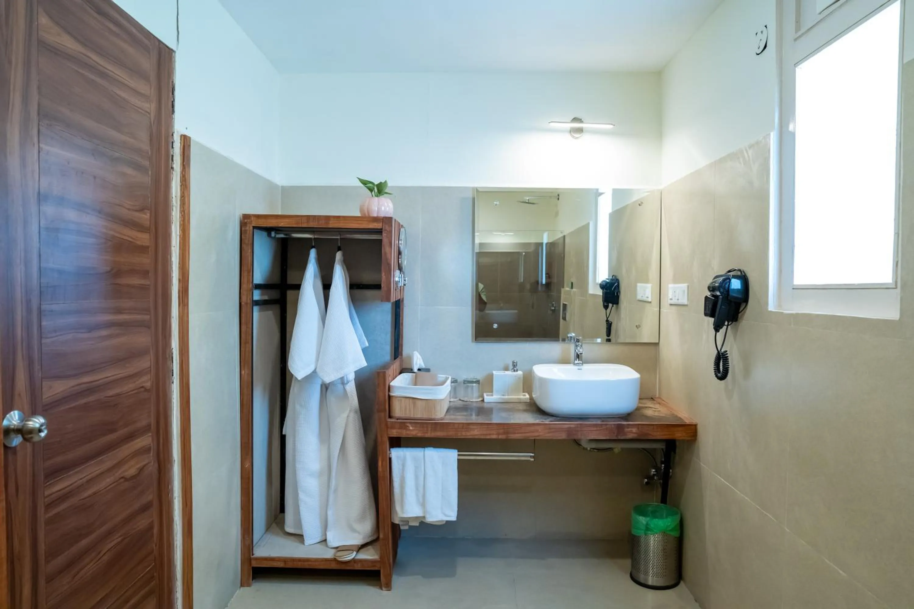 Bathroom in Dev Bhoomi Farms & Cottages