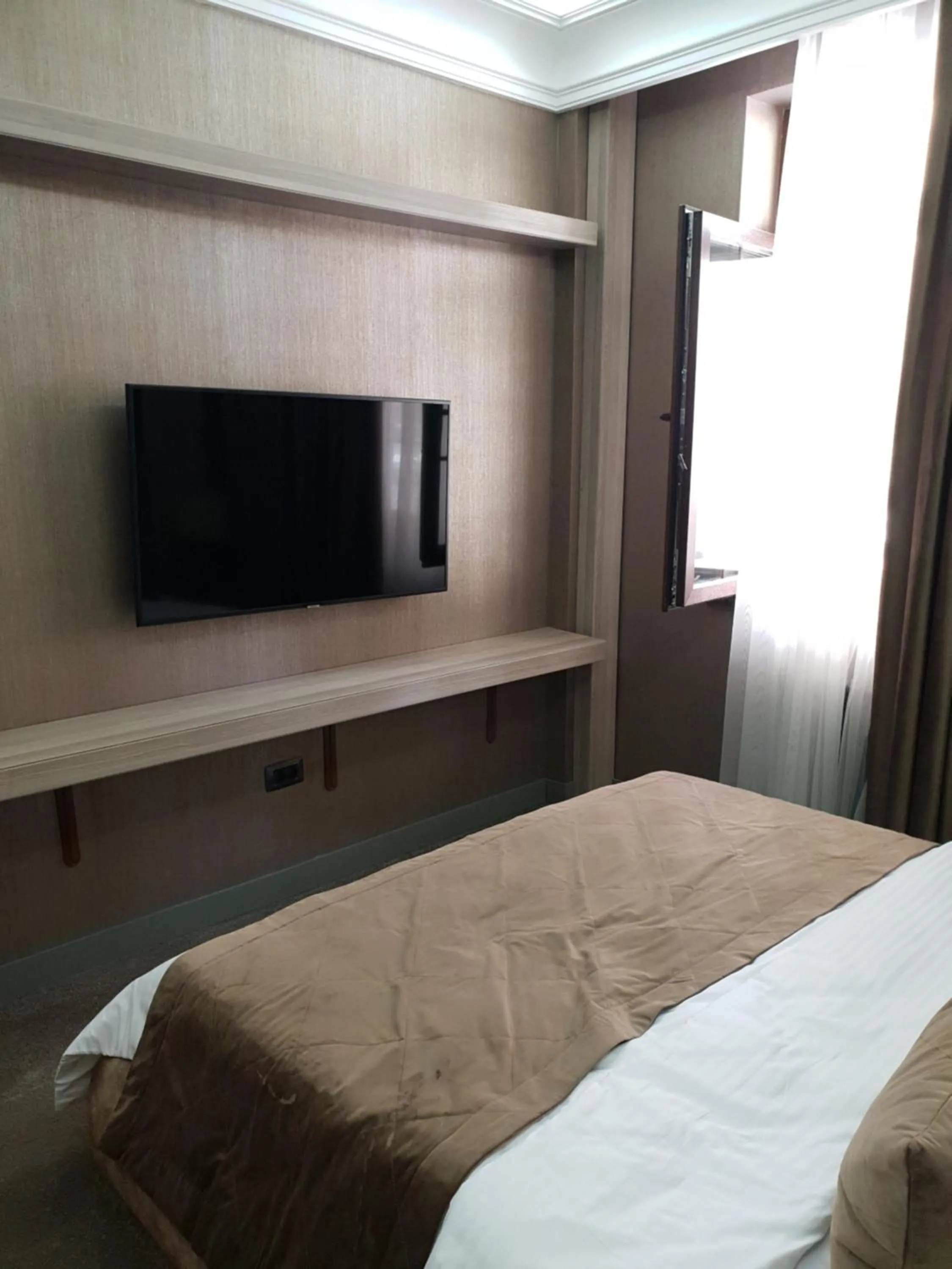 Bed in Home Boutique Hotel