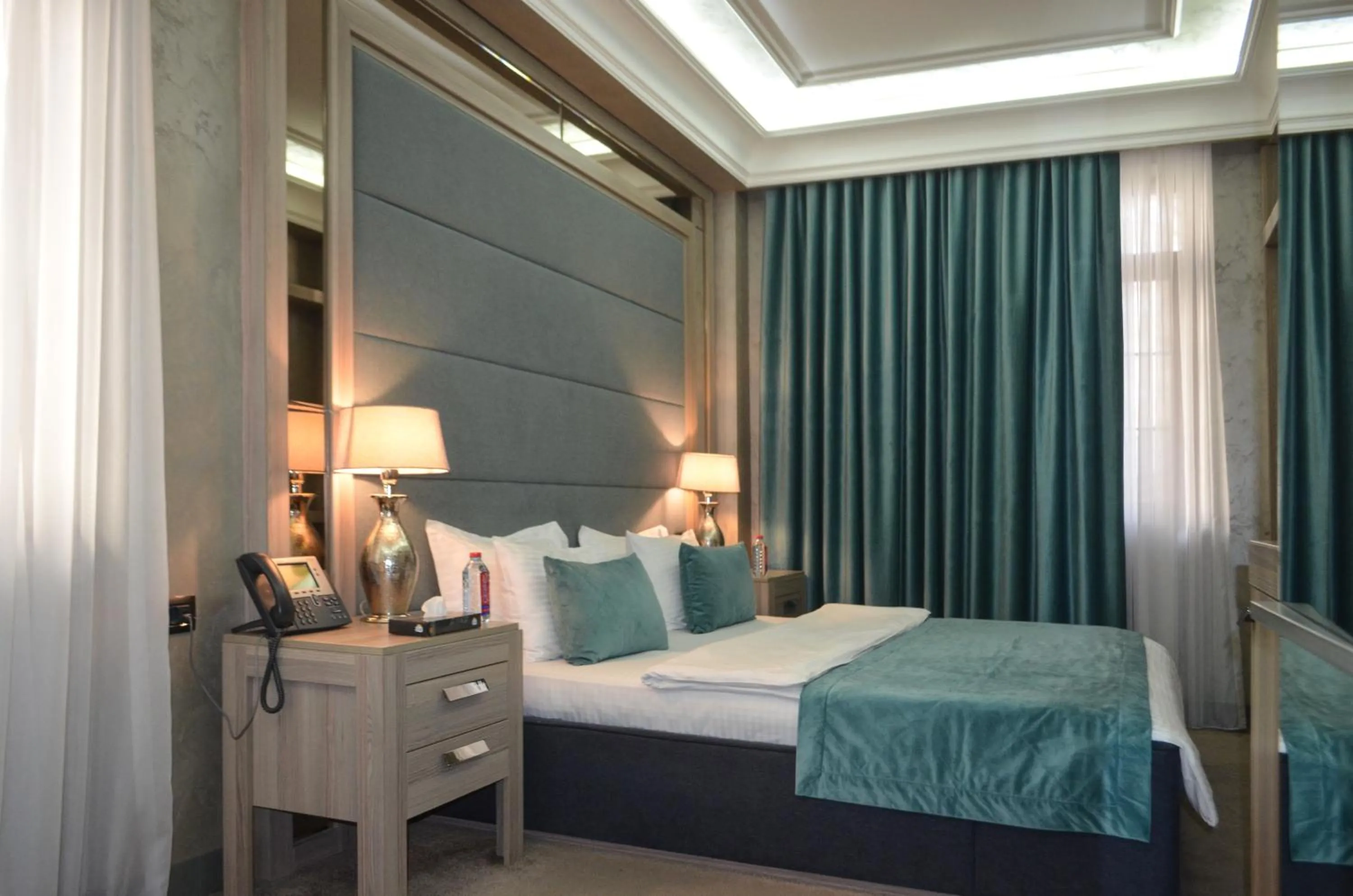 Bed in Home Boutique Hotel