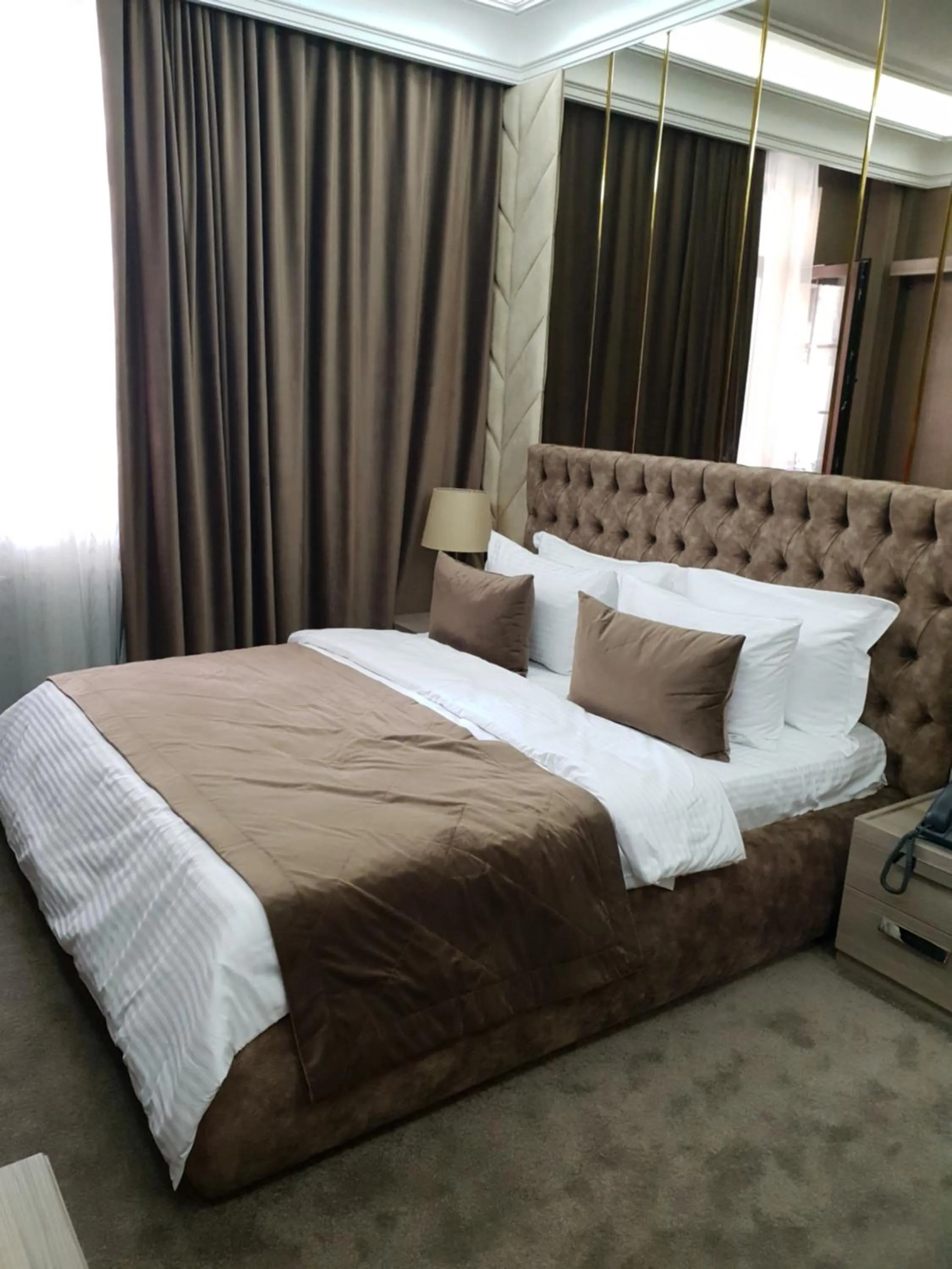 Bed in Home Boutique Hotel