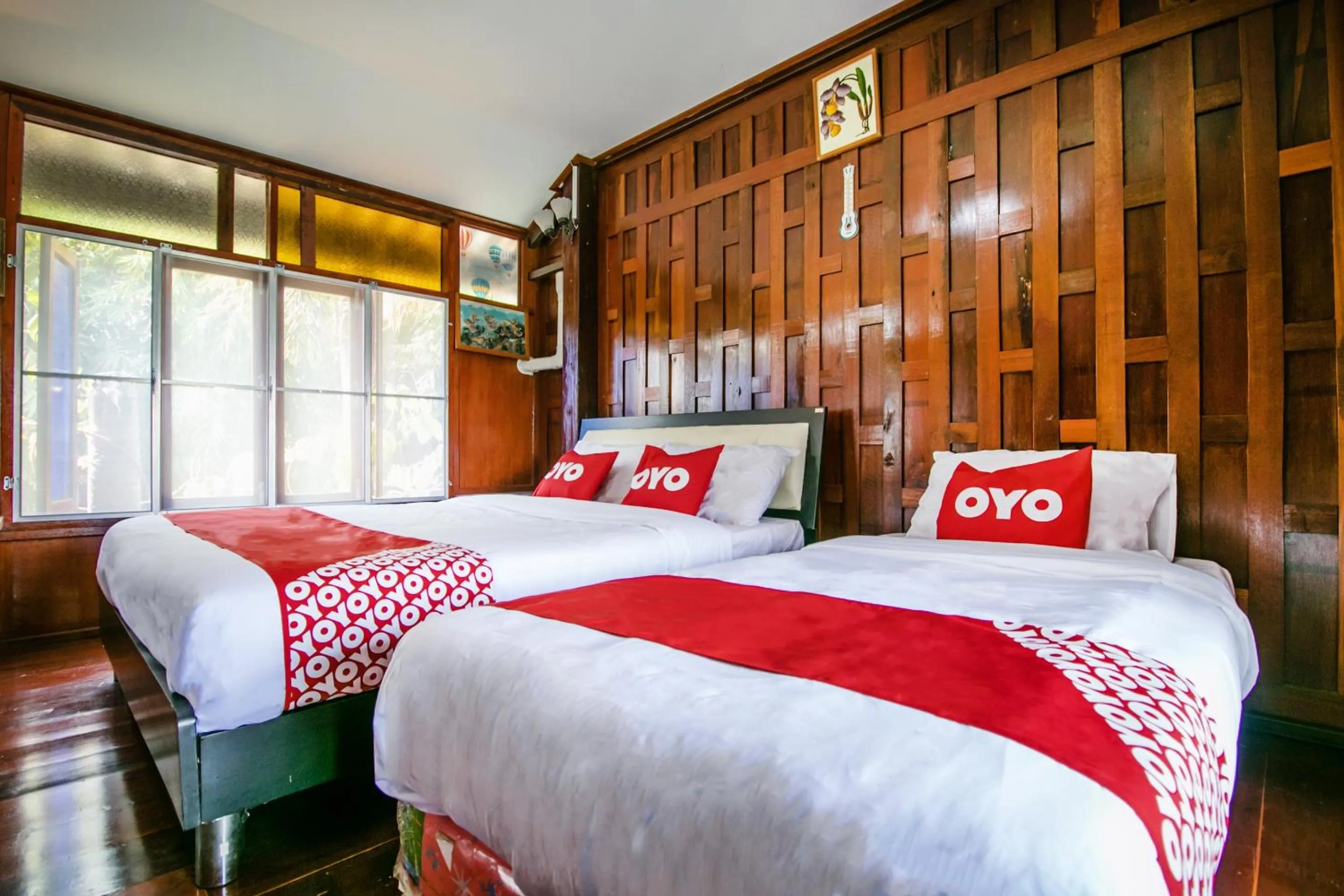 Bedroom in OYO 402 Raknatee Resort