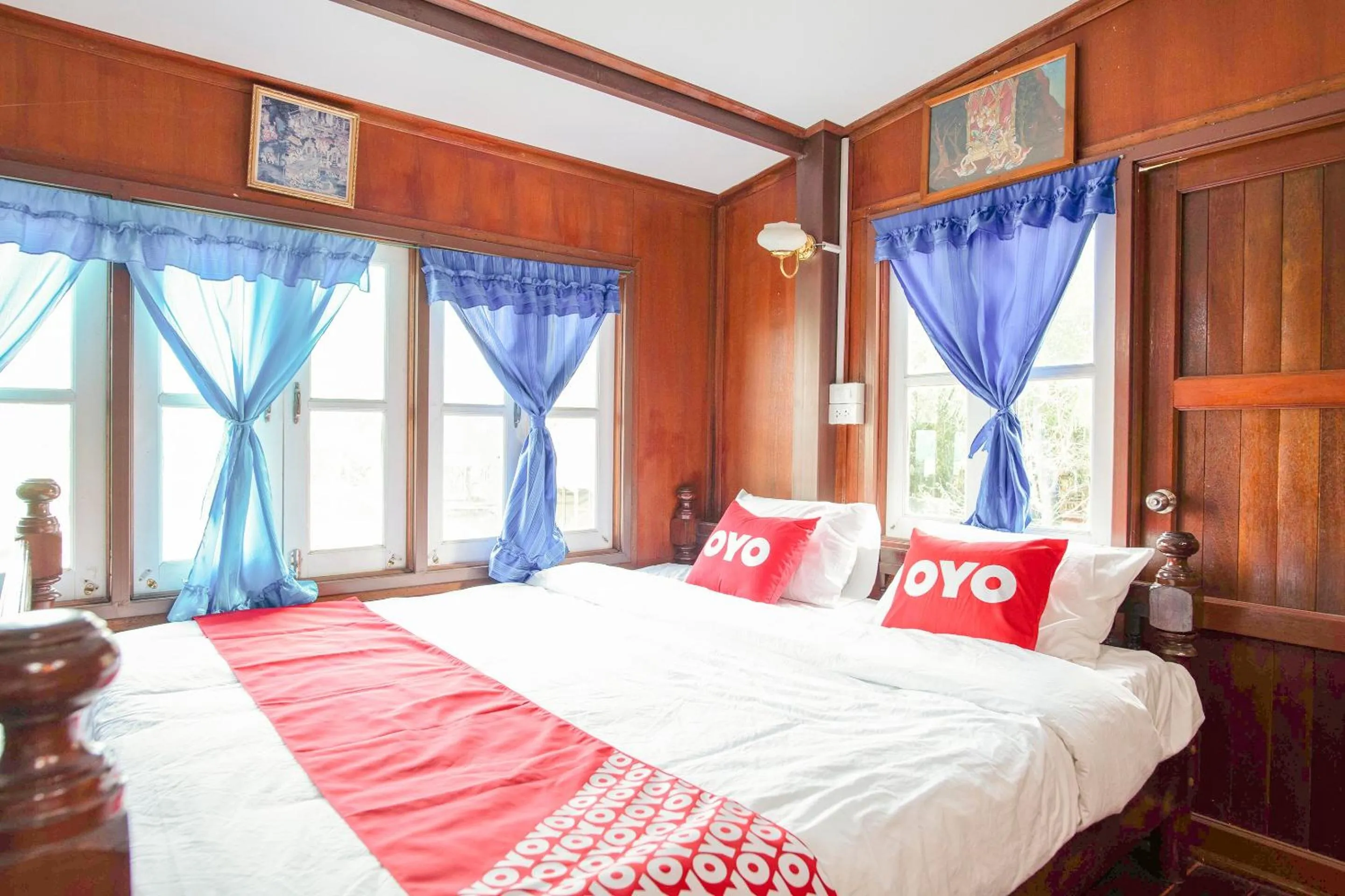 Bedroom in OYO 402 Raknatee Resort