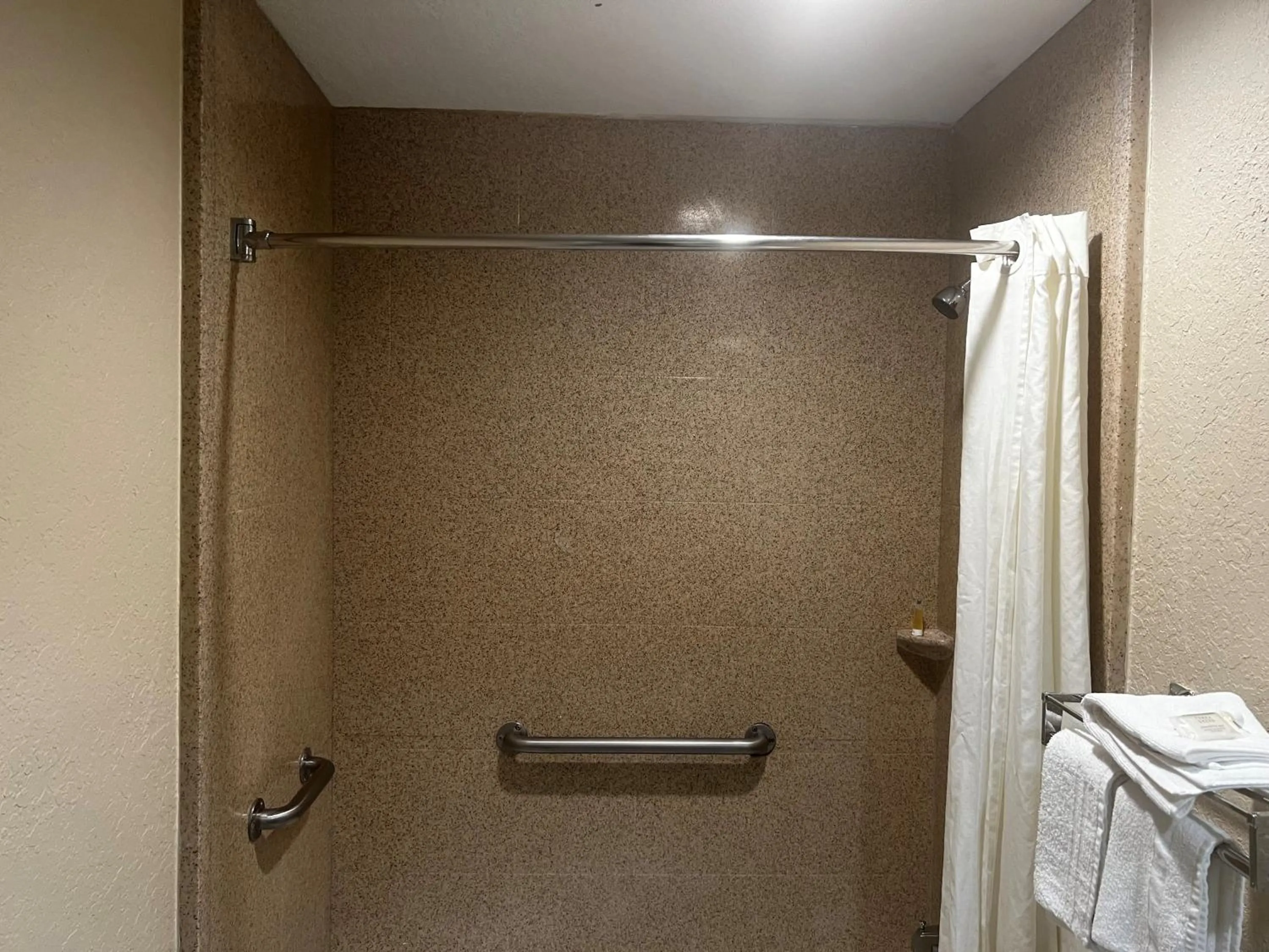 Bathroom in Super 8 by Wyndham La Marque TX/Texas City Area