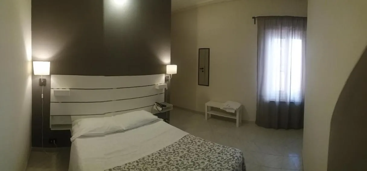 Bedroom in HOTEL MALIBU