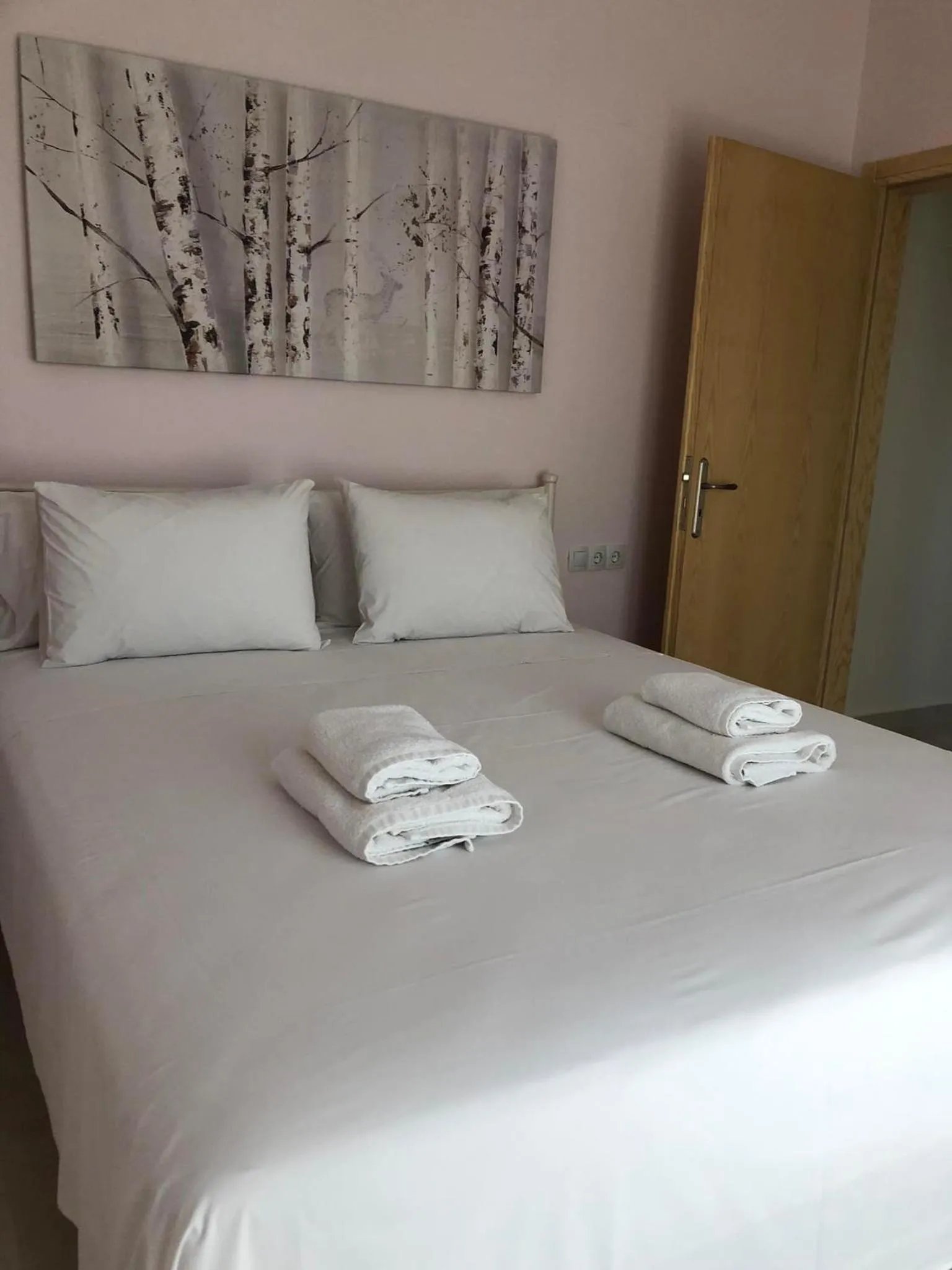 Bed in Bounatsa Studios & Apartments