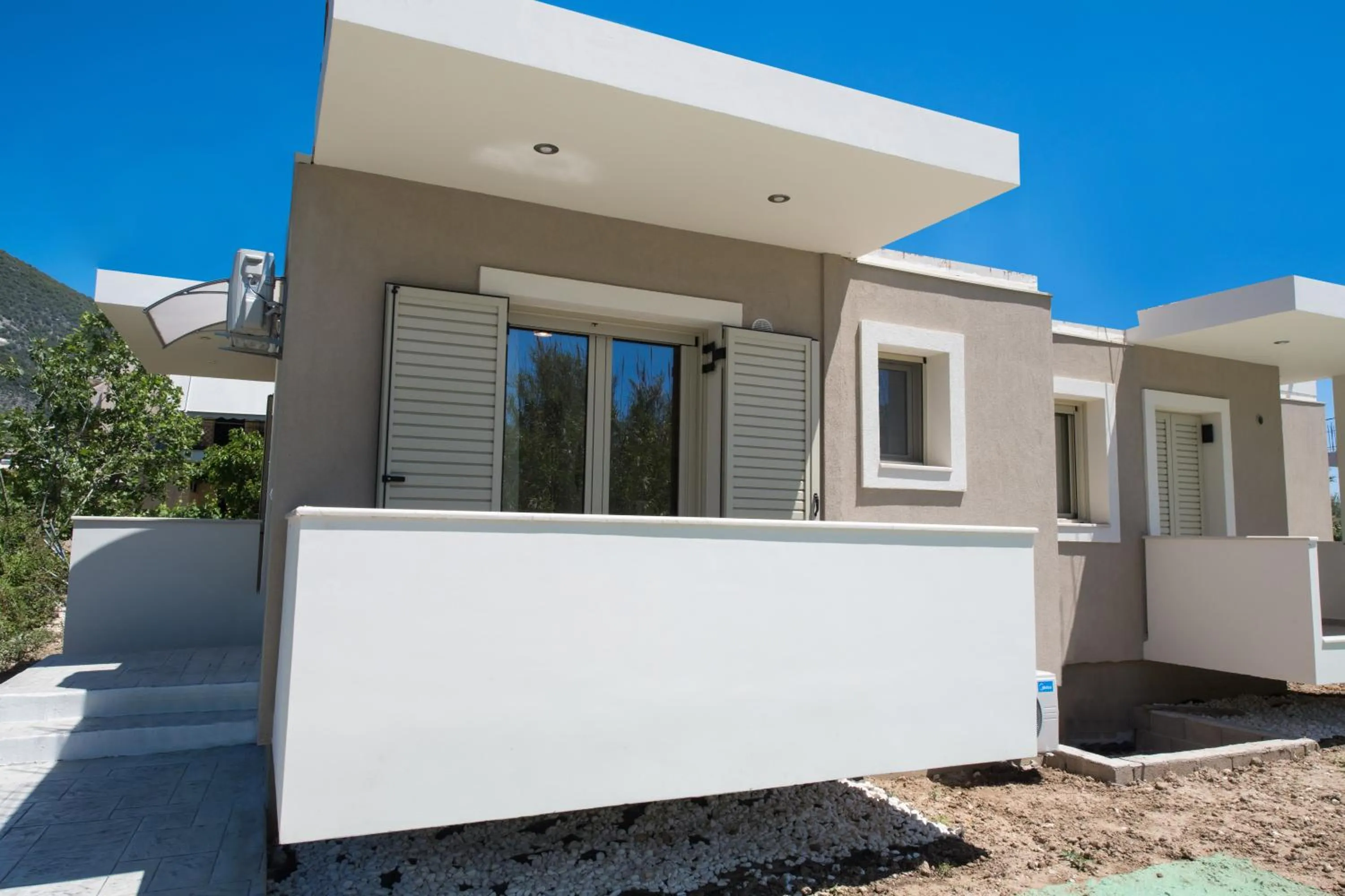 Property building in Bounatsa Studios & Apartments