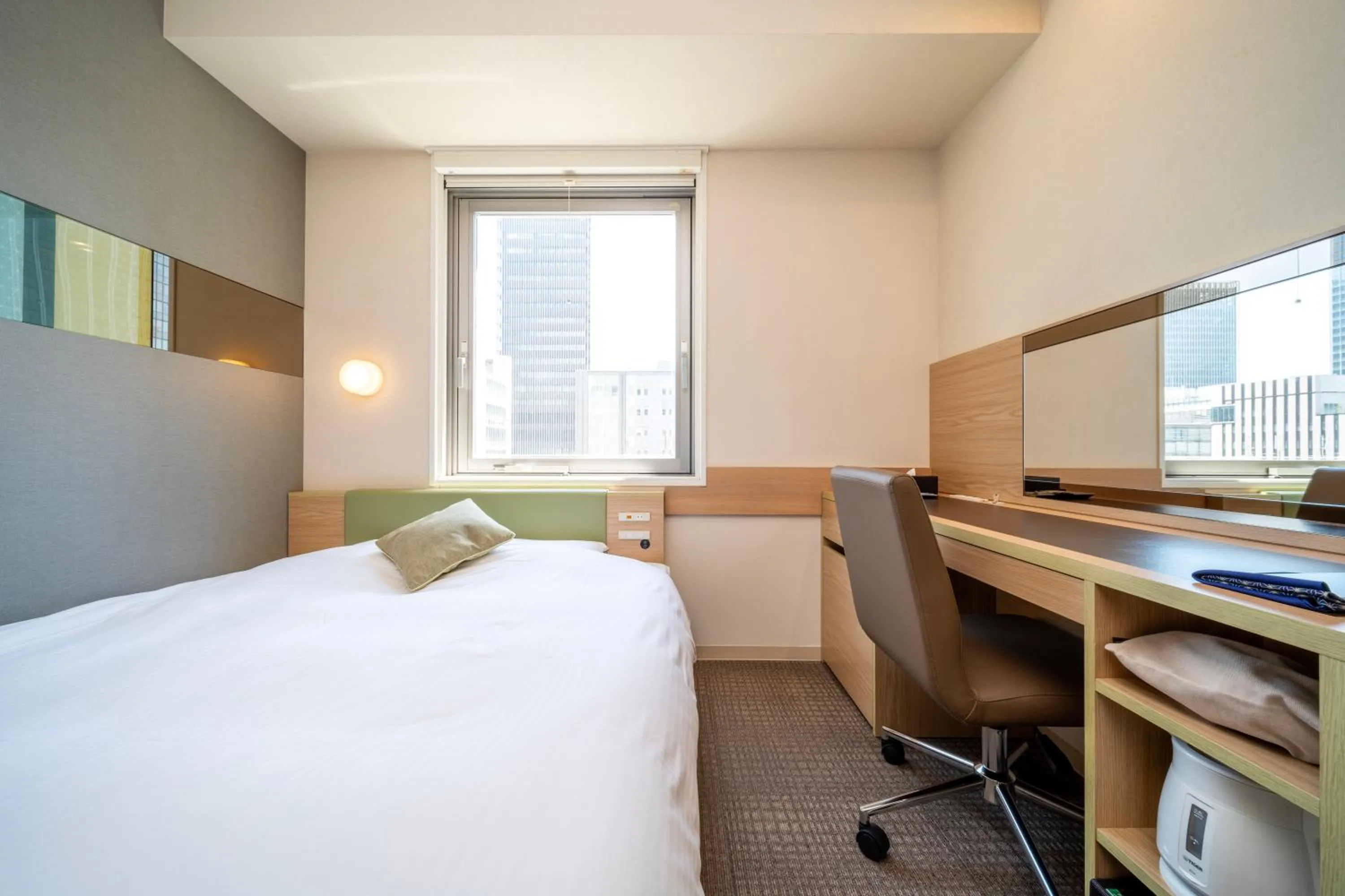 Bed in Super Hotel Premier Tokyo Station Yaesu-Chuoguchi