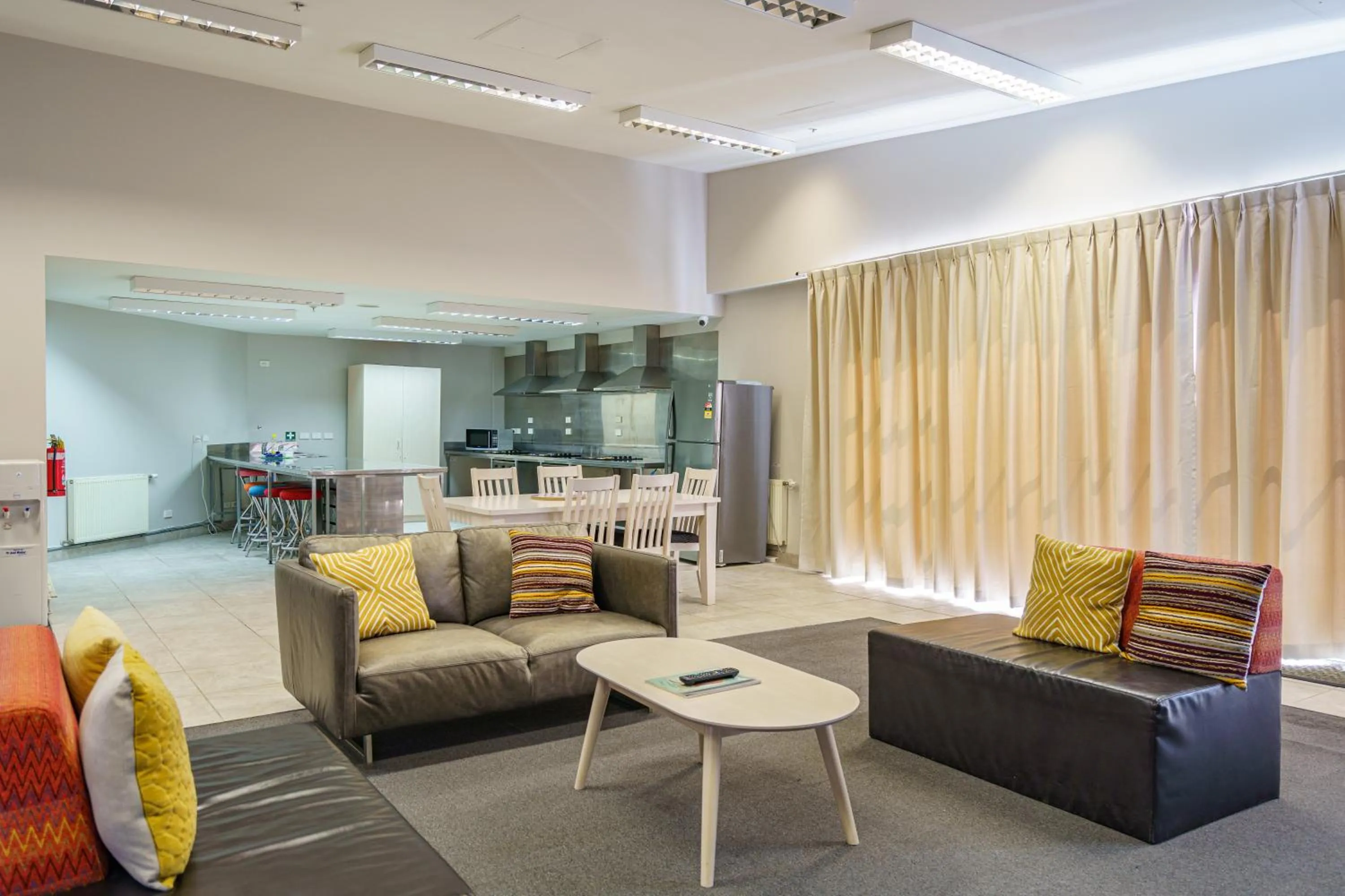 Communal lounge/ TV room in Ibis Styles Invercargill