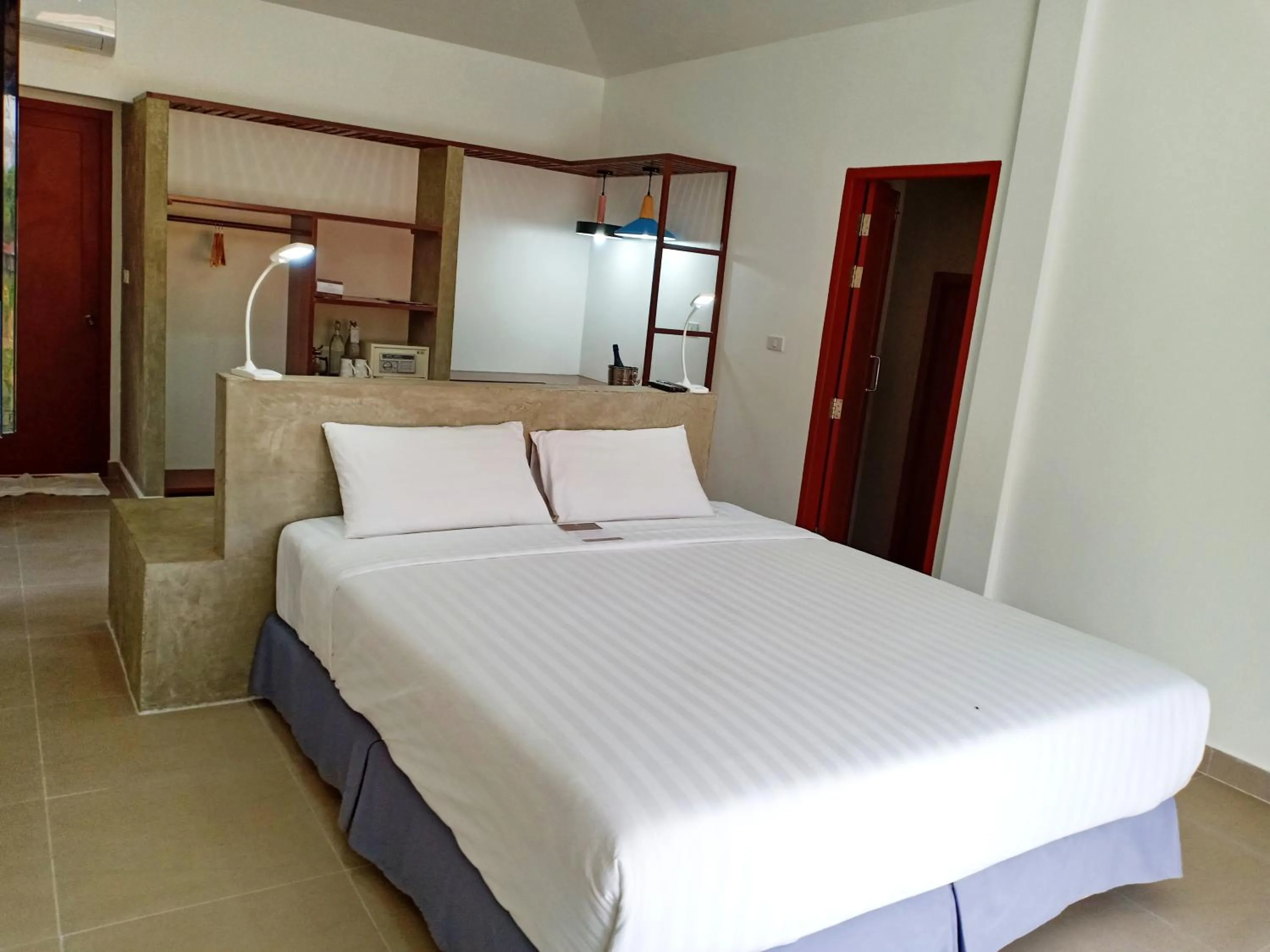 Bed in The Sanctuary Nam Ngum Beach Resort