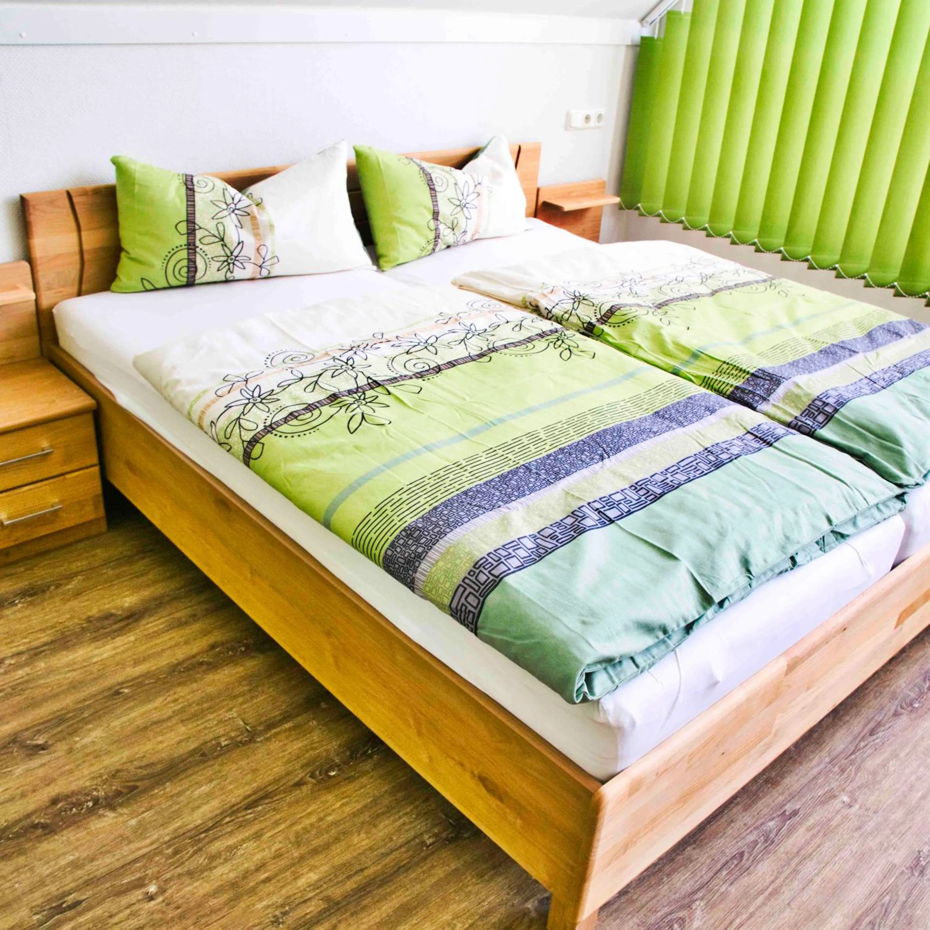 Bed in Gästehäuschen-Hösbach