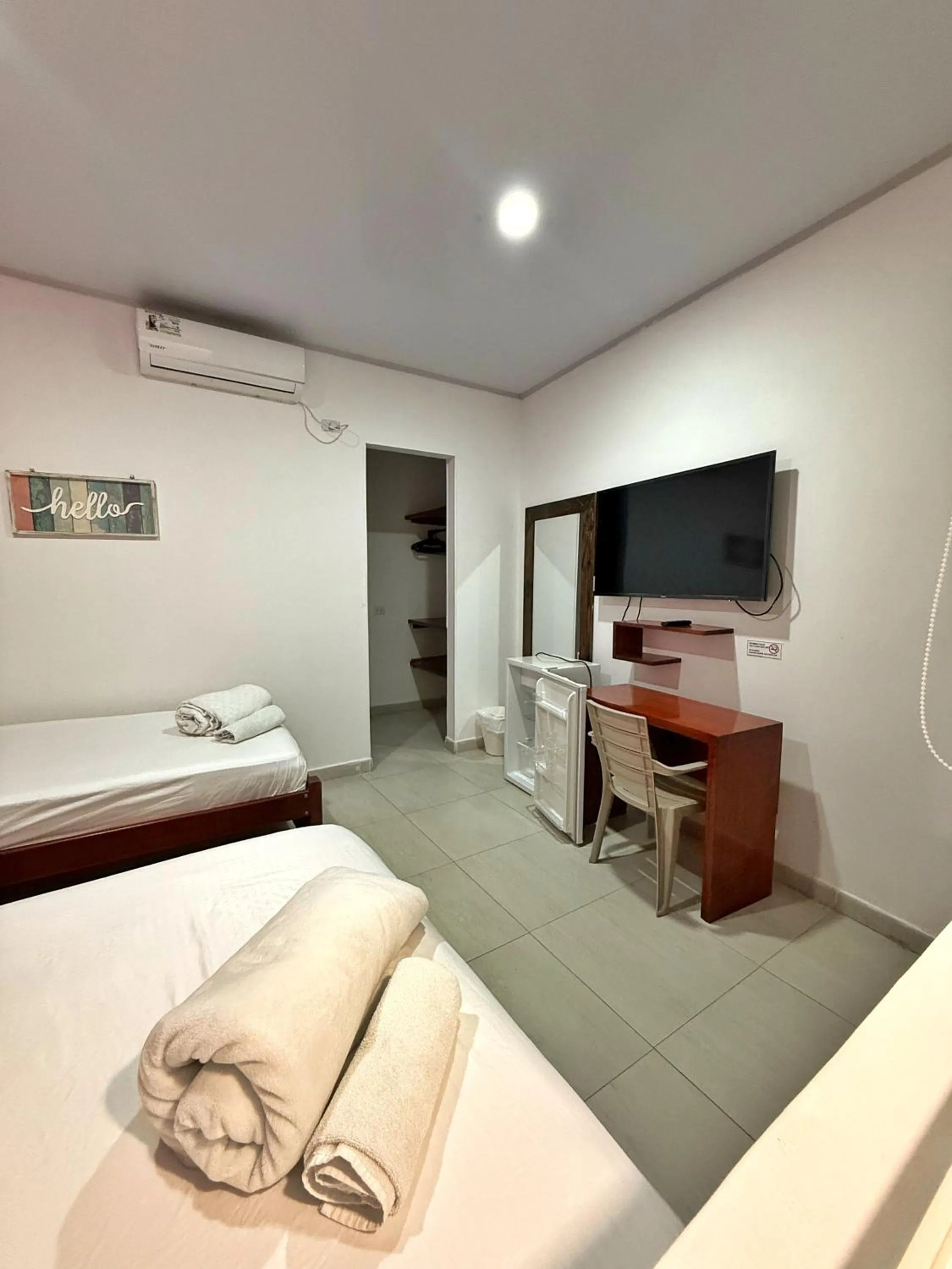 TV and multimedia, Bed in Apartahotel Caribe Diez