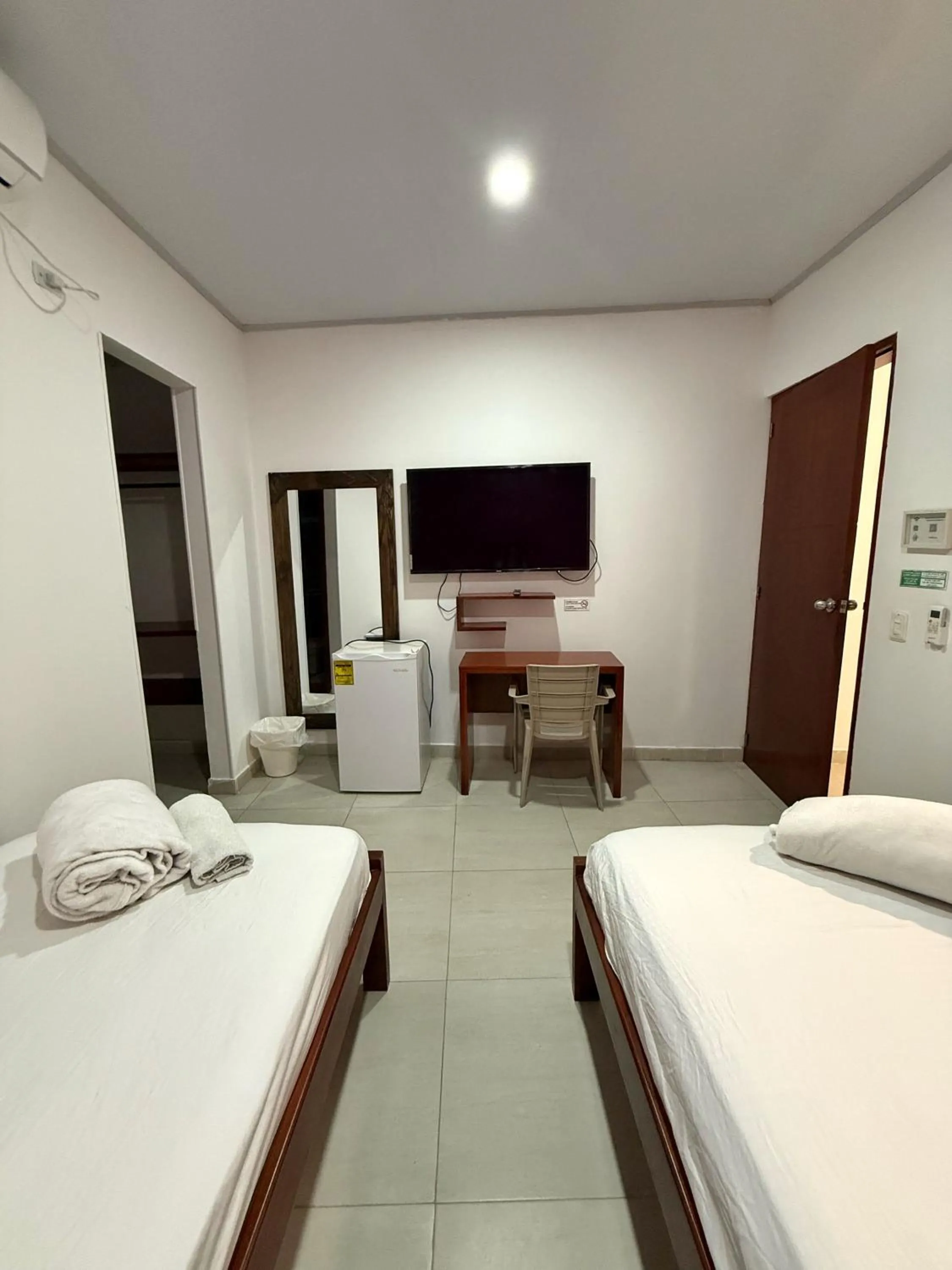 Photo of the whole room, Bed in Apartahotel Caribe Diez