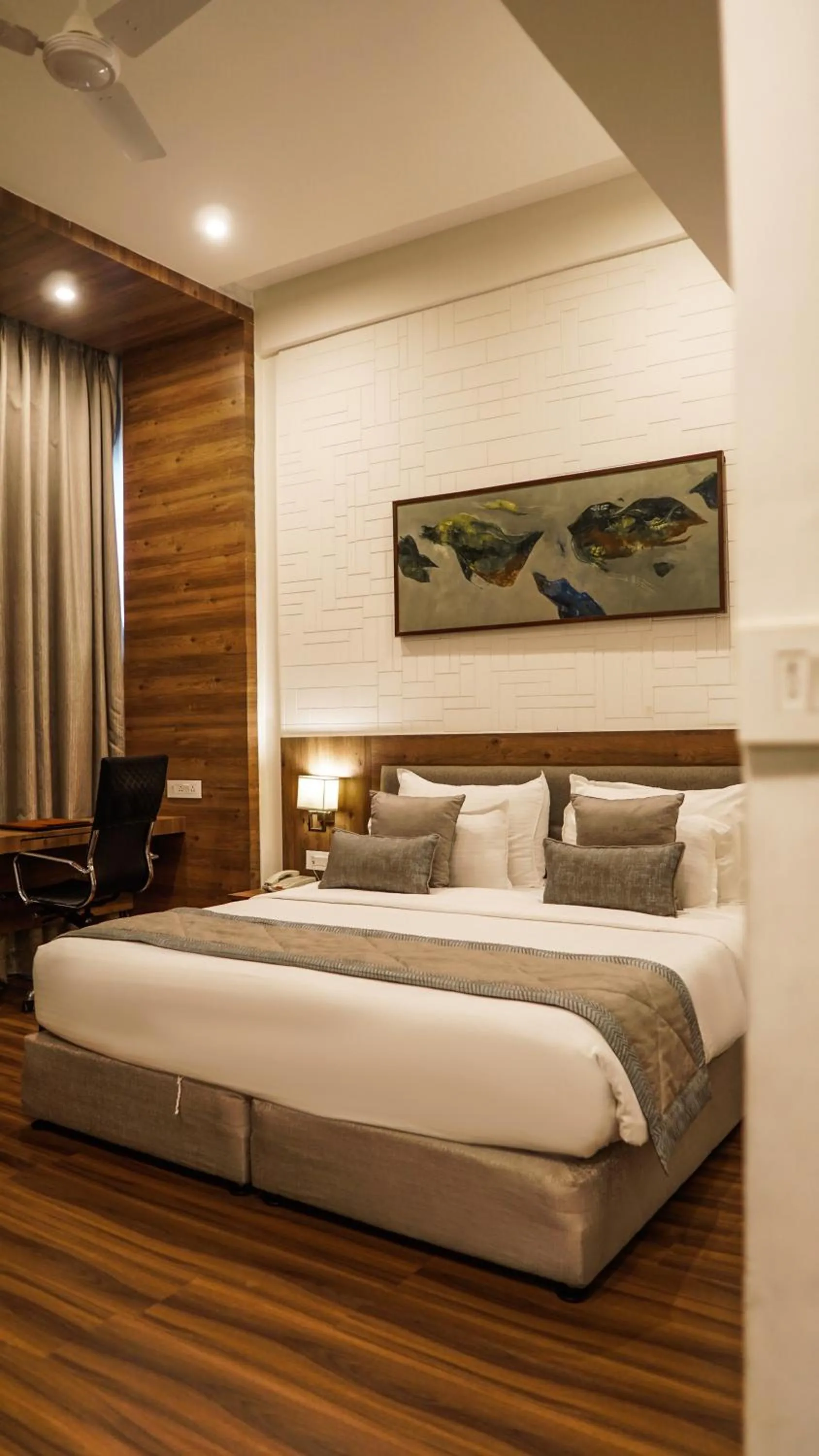 Seating area, Bed in Hotel Centre Point