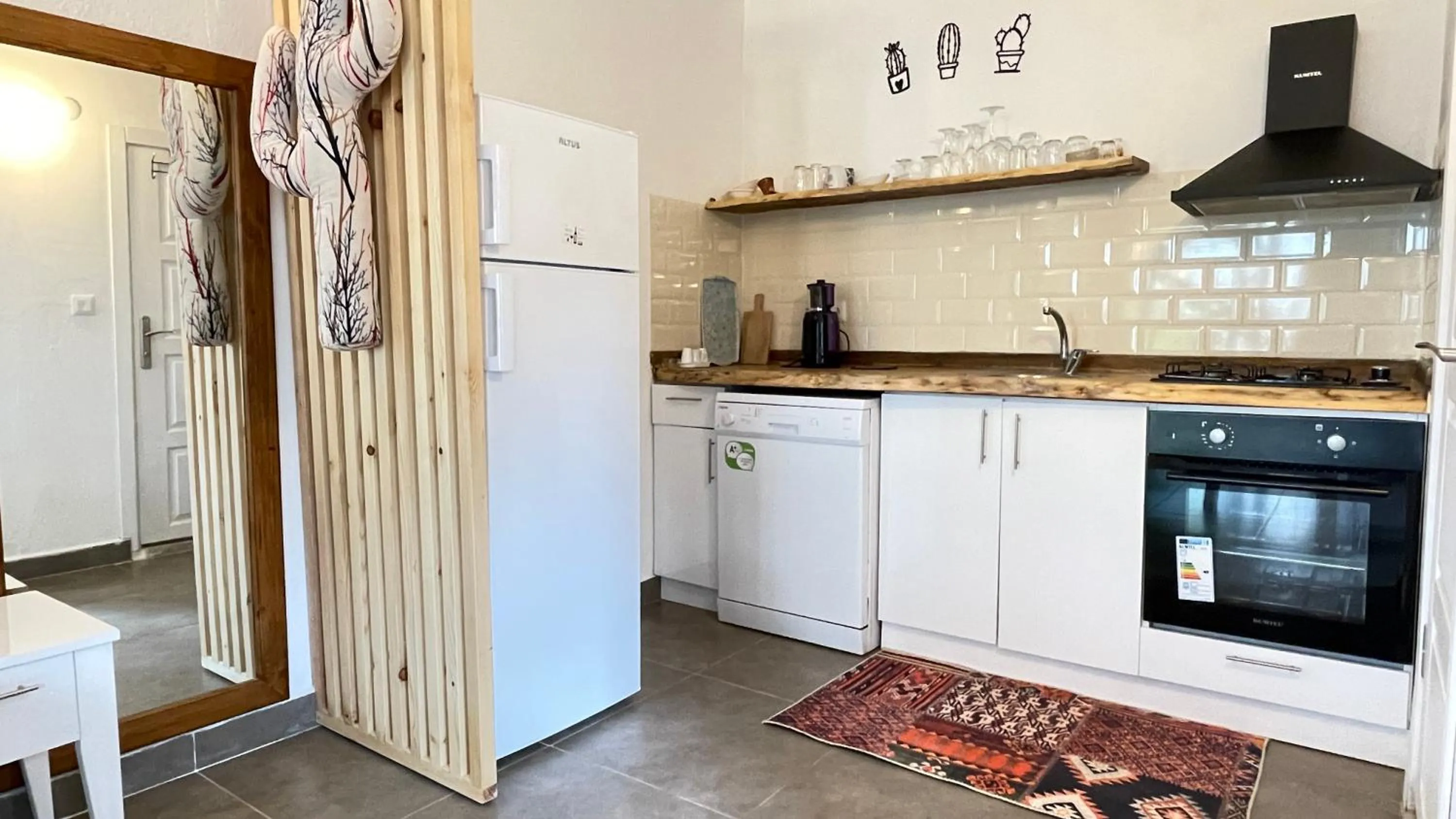 Kitchen or kitchenette in Kaktus Beach Apart