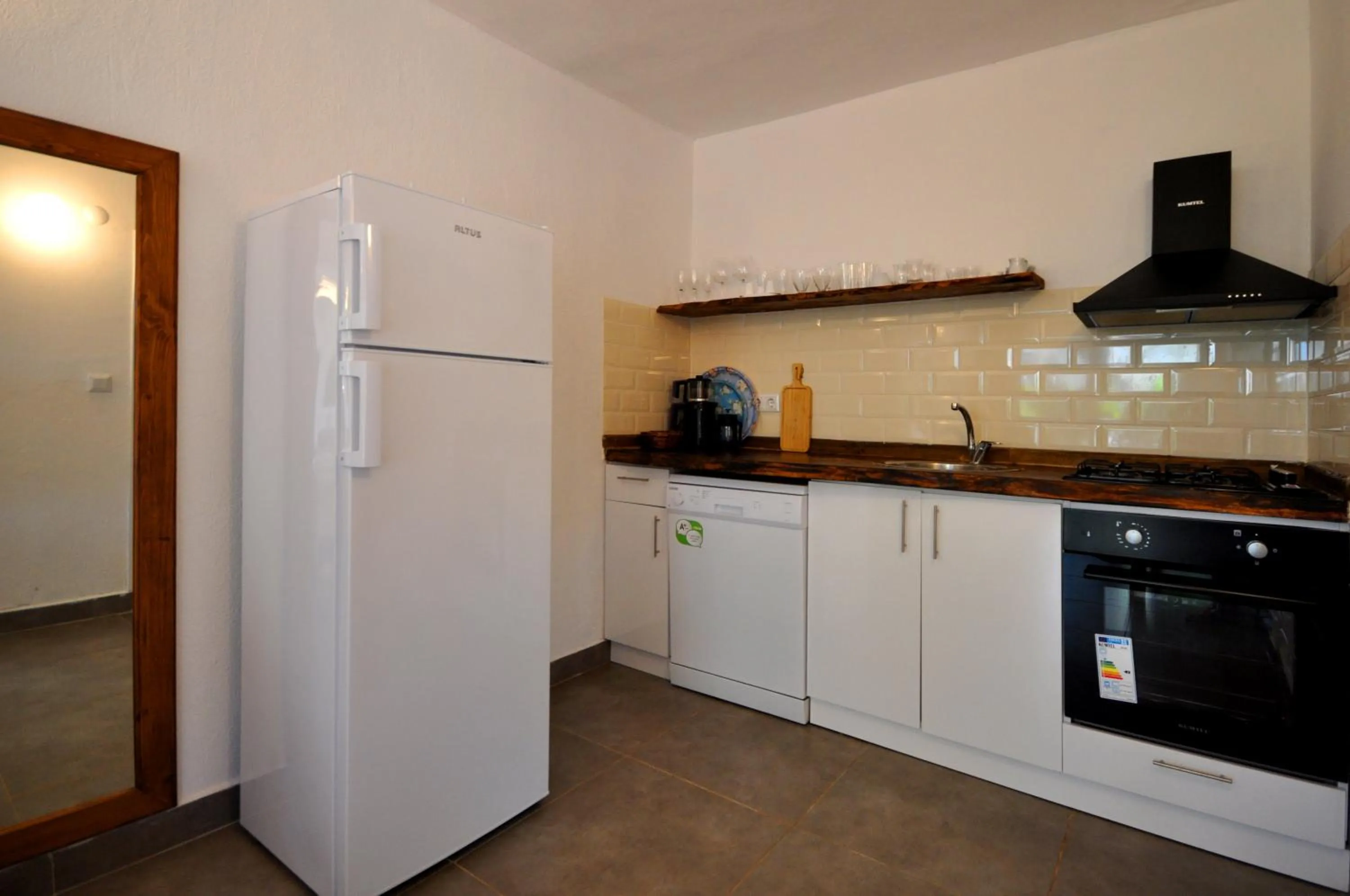 Kitchen or kitchenette in Kaktus Beach Apart