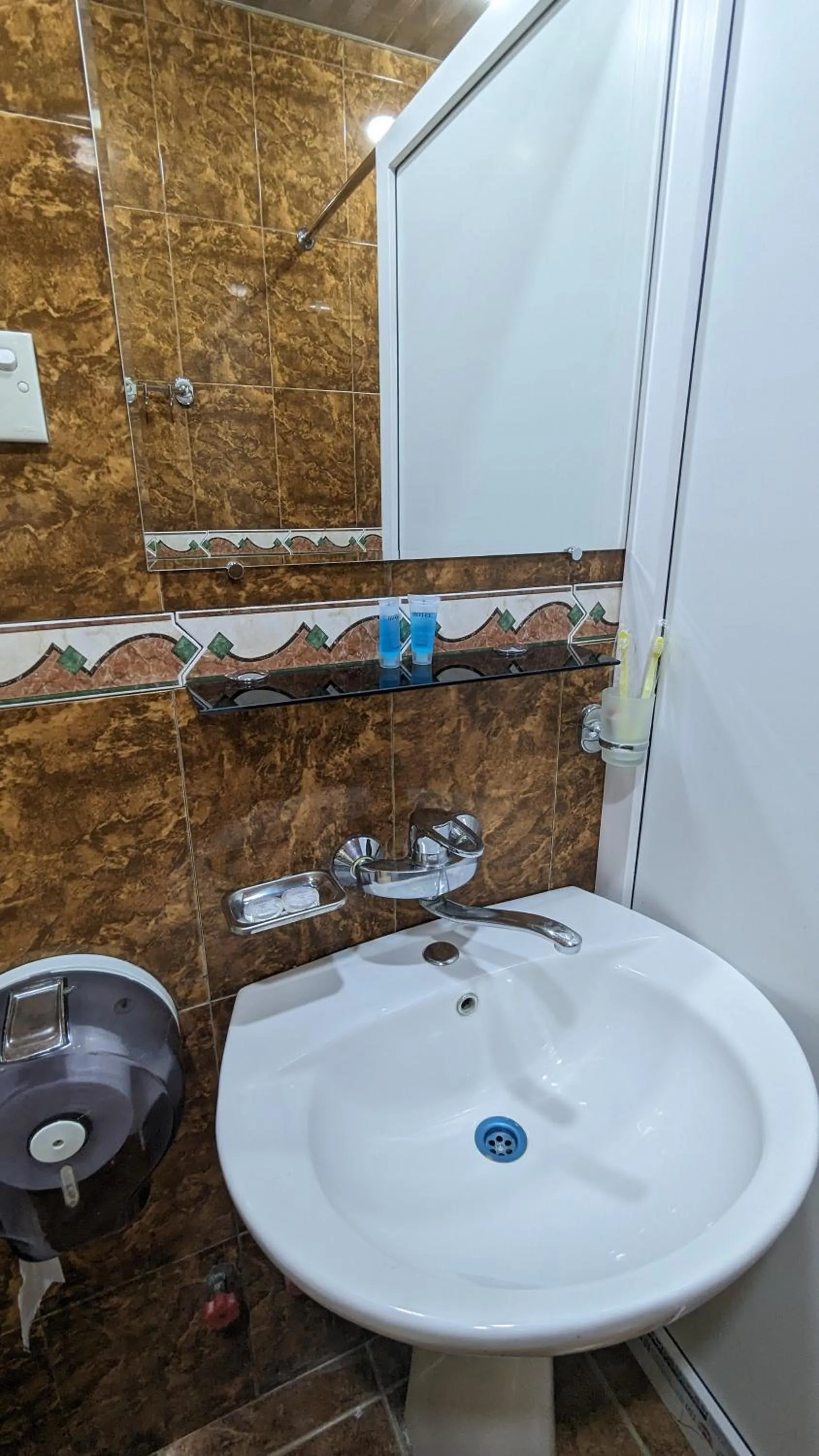 Bathroom in Dkd-bridge Hotel