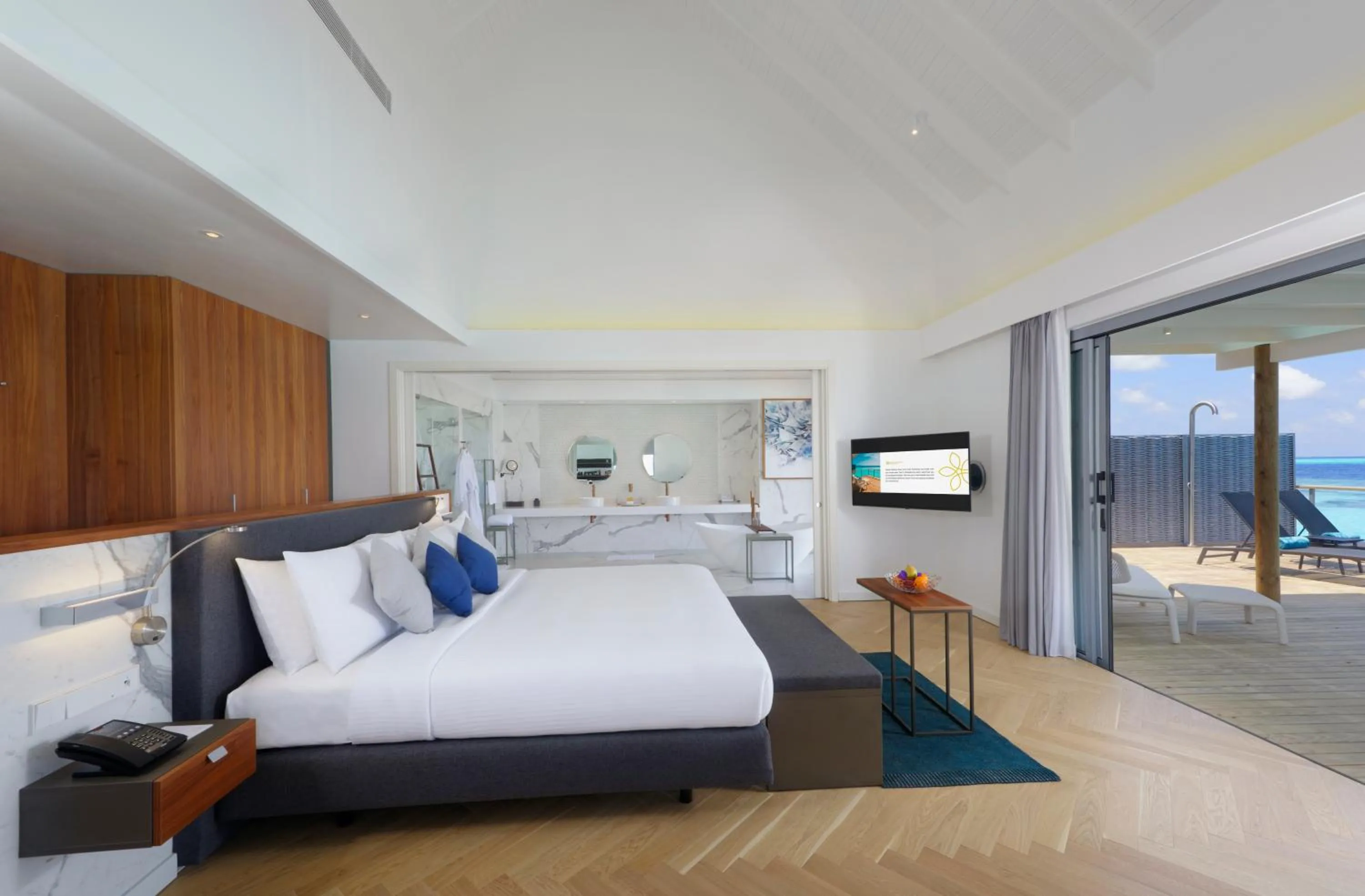 Living room, Bed in OUTRIGGER Maldives Maafushivaru Resort