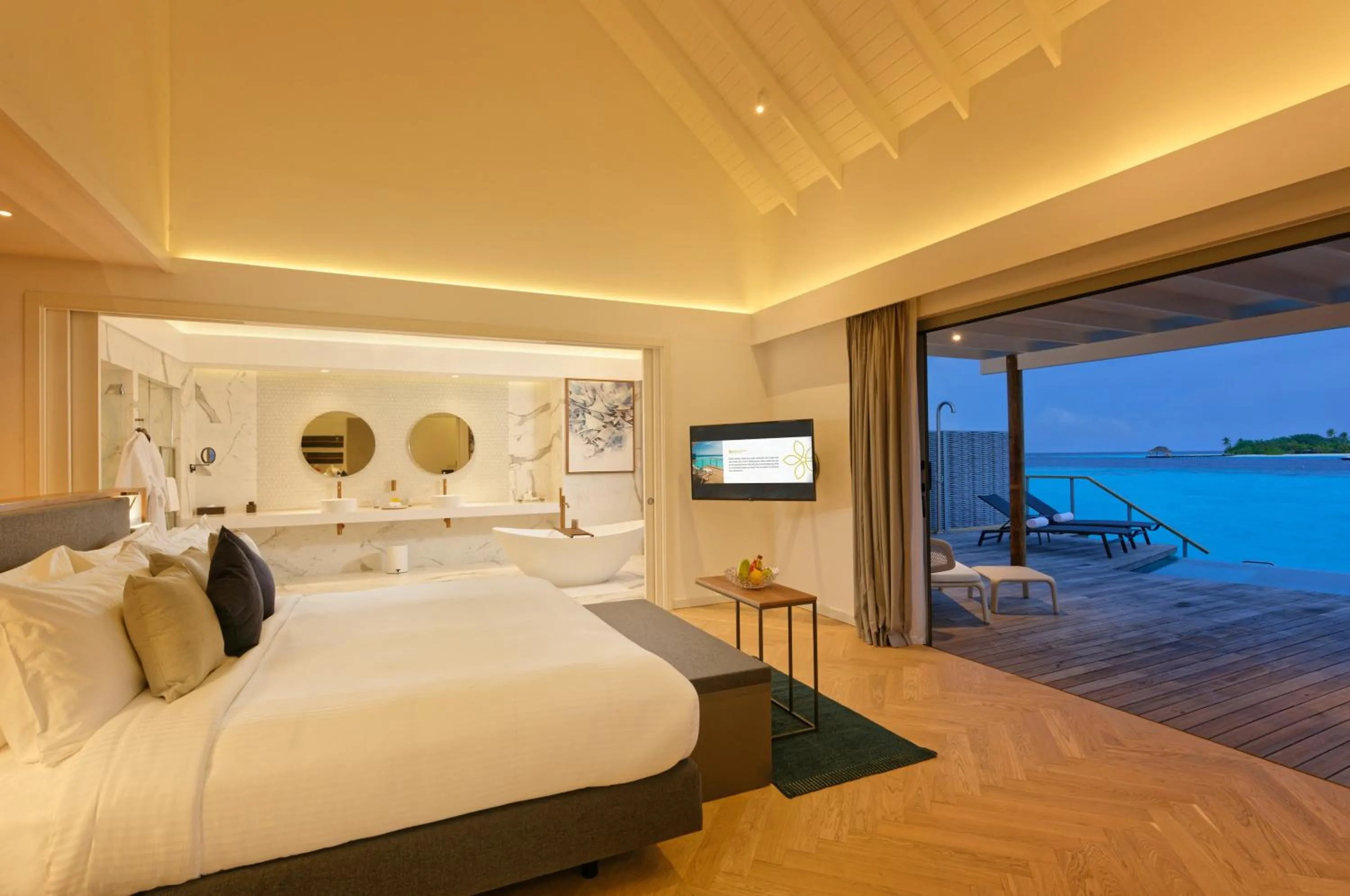 Shower, Bed in OUTRIGGER Maldives Maafushivaru Resort