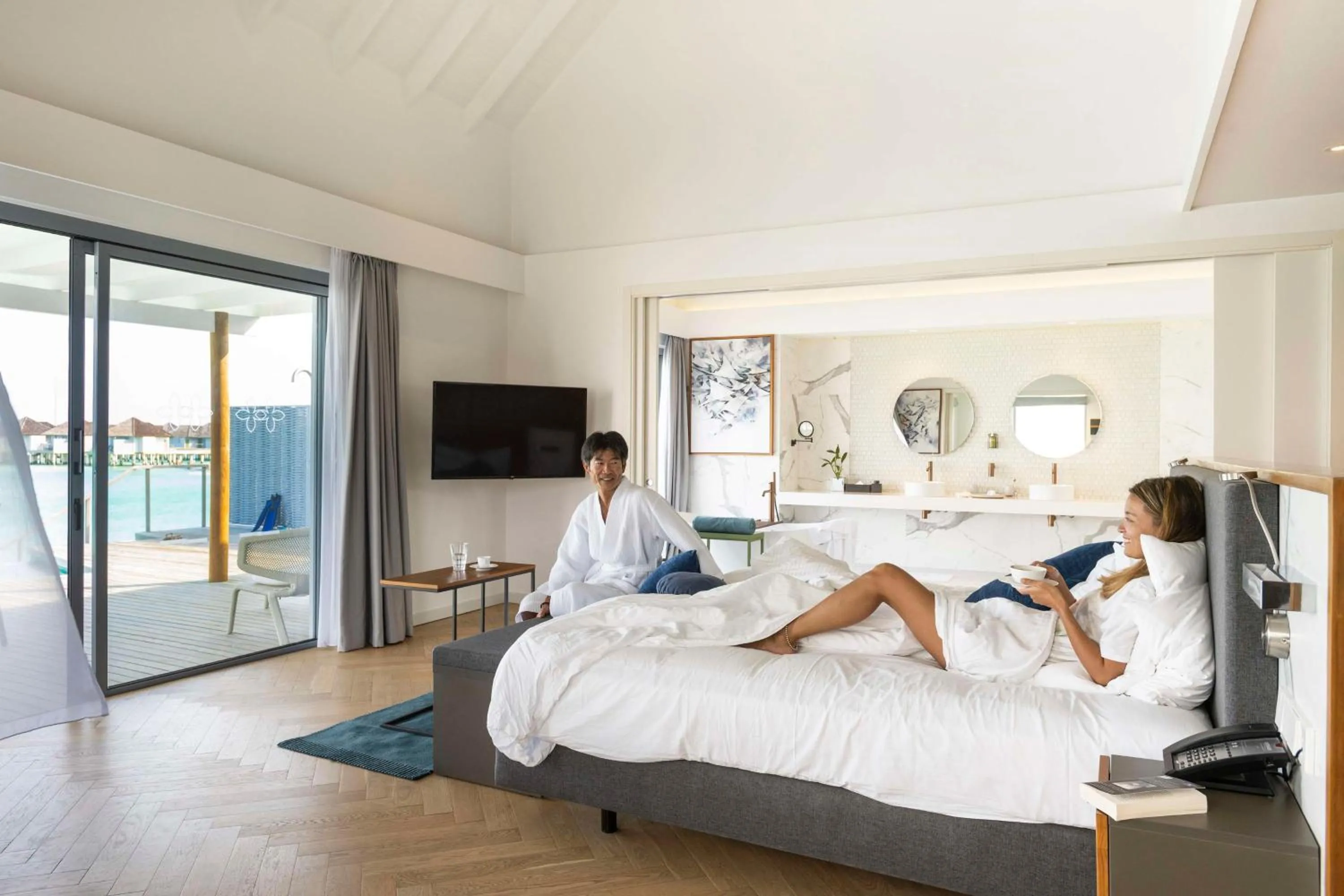 Photo of the whole room, Bed in OUTRIGGER Maldives Maafushivaru Resort