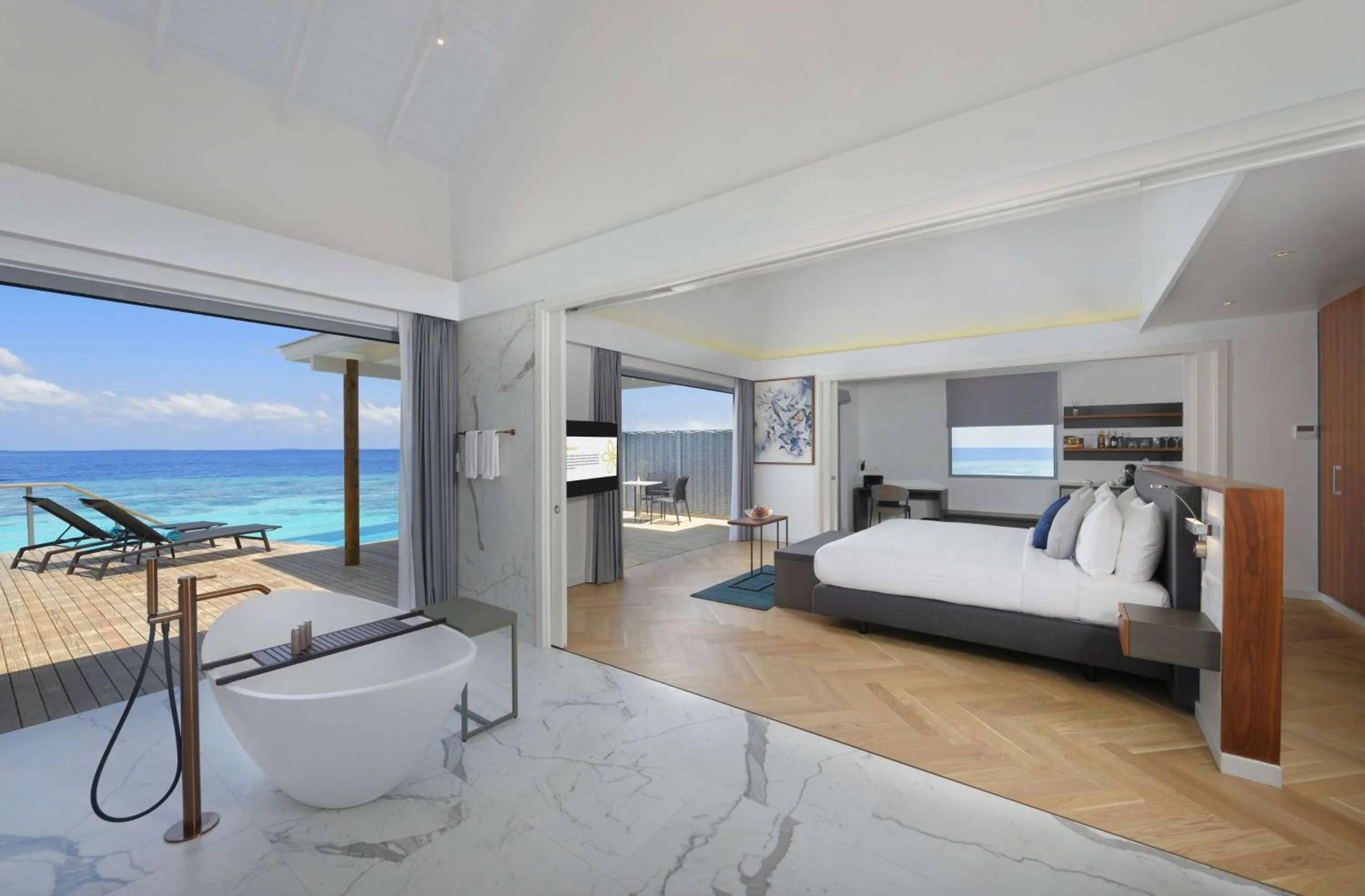 Photo of the whole room, Bed in OUTRIGGER Maldives Maafushivaru Resort