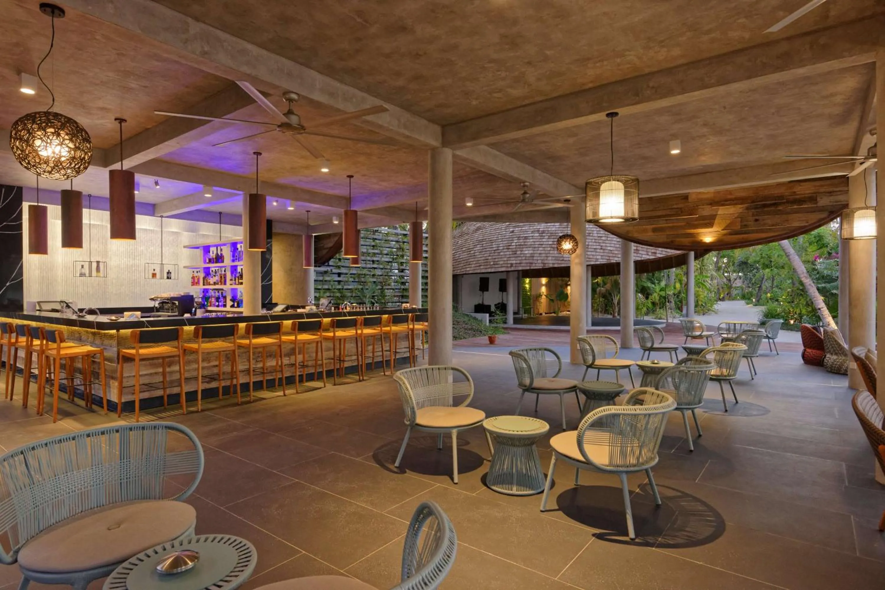 Lounge or bar in OUTRIGGER Maldives Maafushivaru Resort