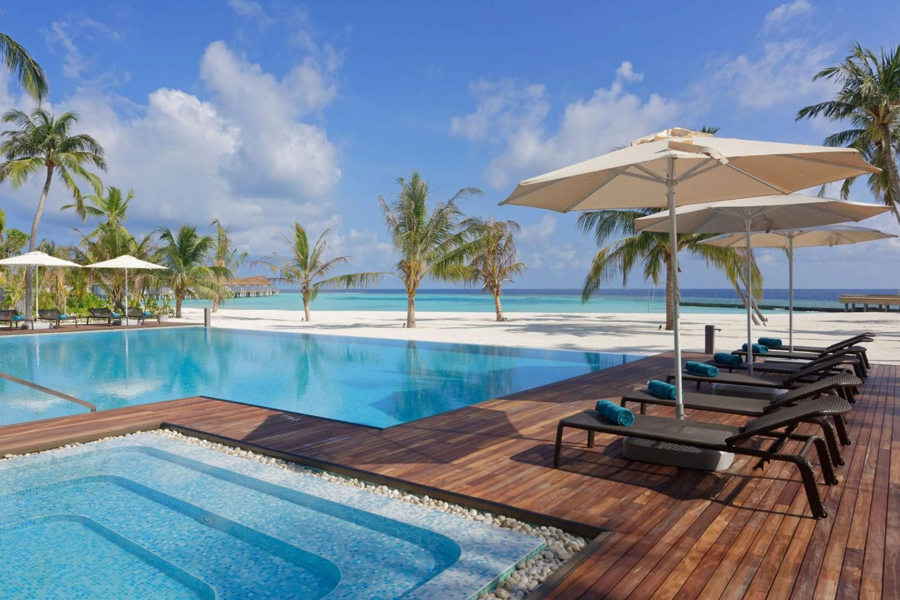 Pool view in OUTRIGGER Maldives Maafushivaru Resort