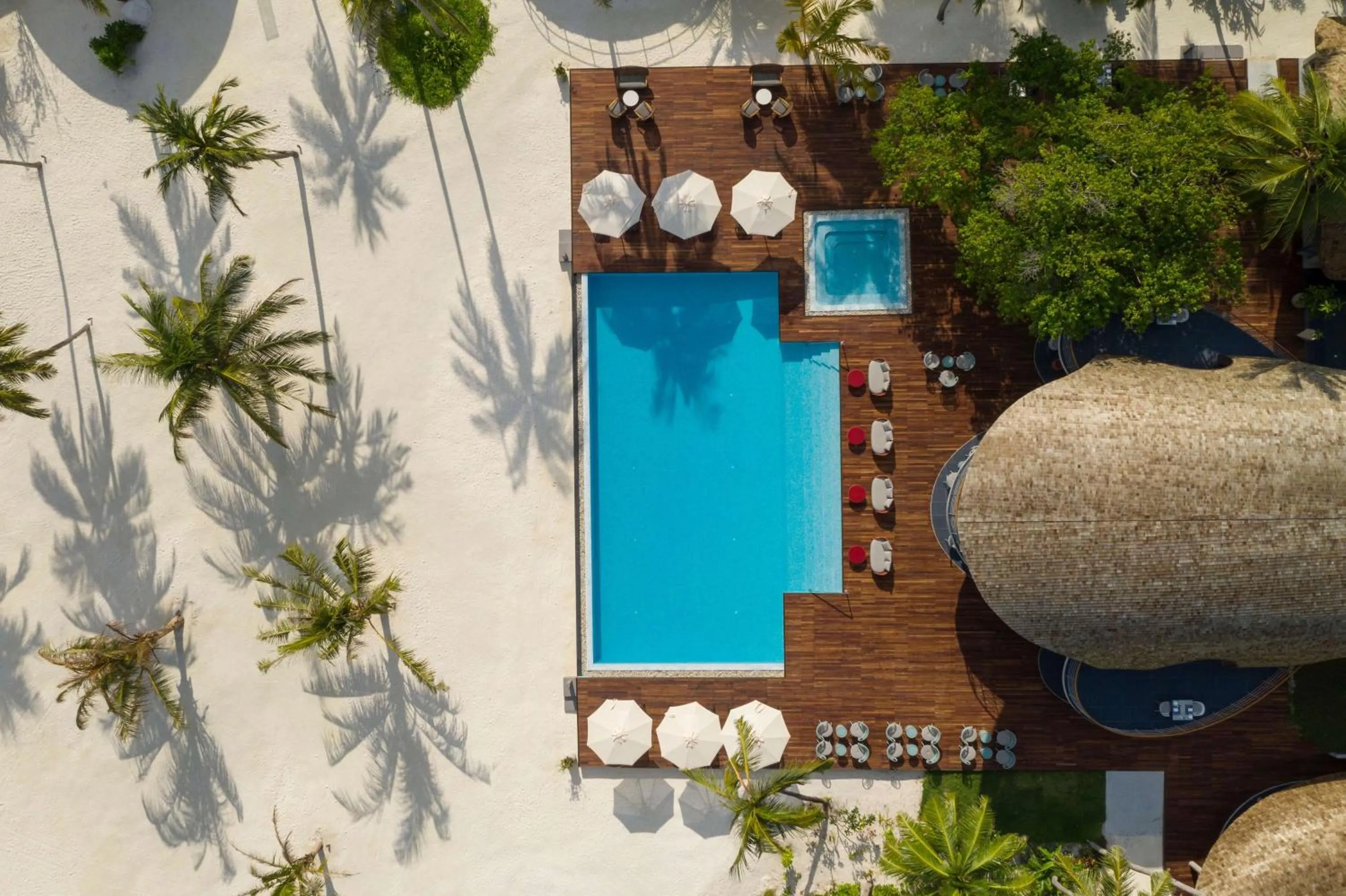 Pool view in OUTRIGGER Maldives Maafushivaru Resort
