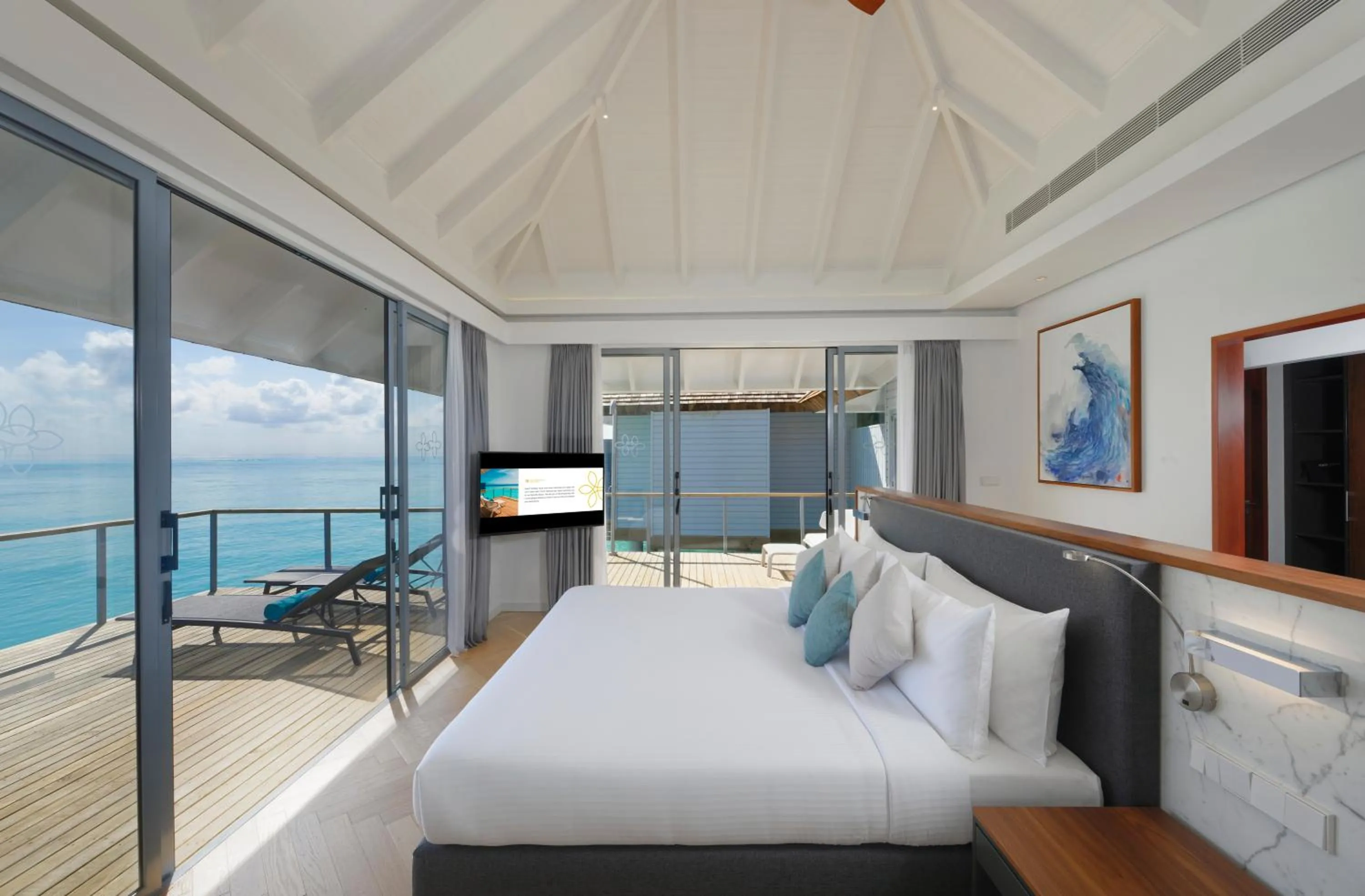 Balcony/Terrace, Bed in OUTRIGGER Maldives Maafushivaru Resort